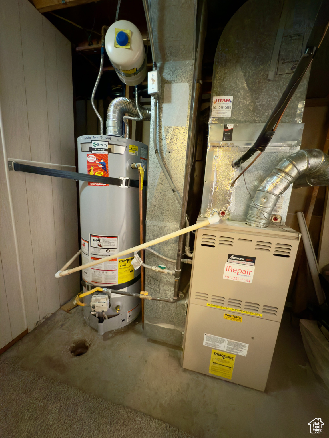 Utility room with secured water heater