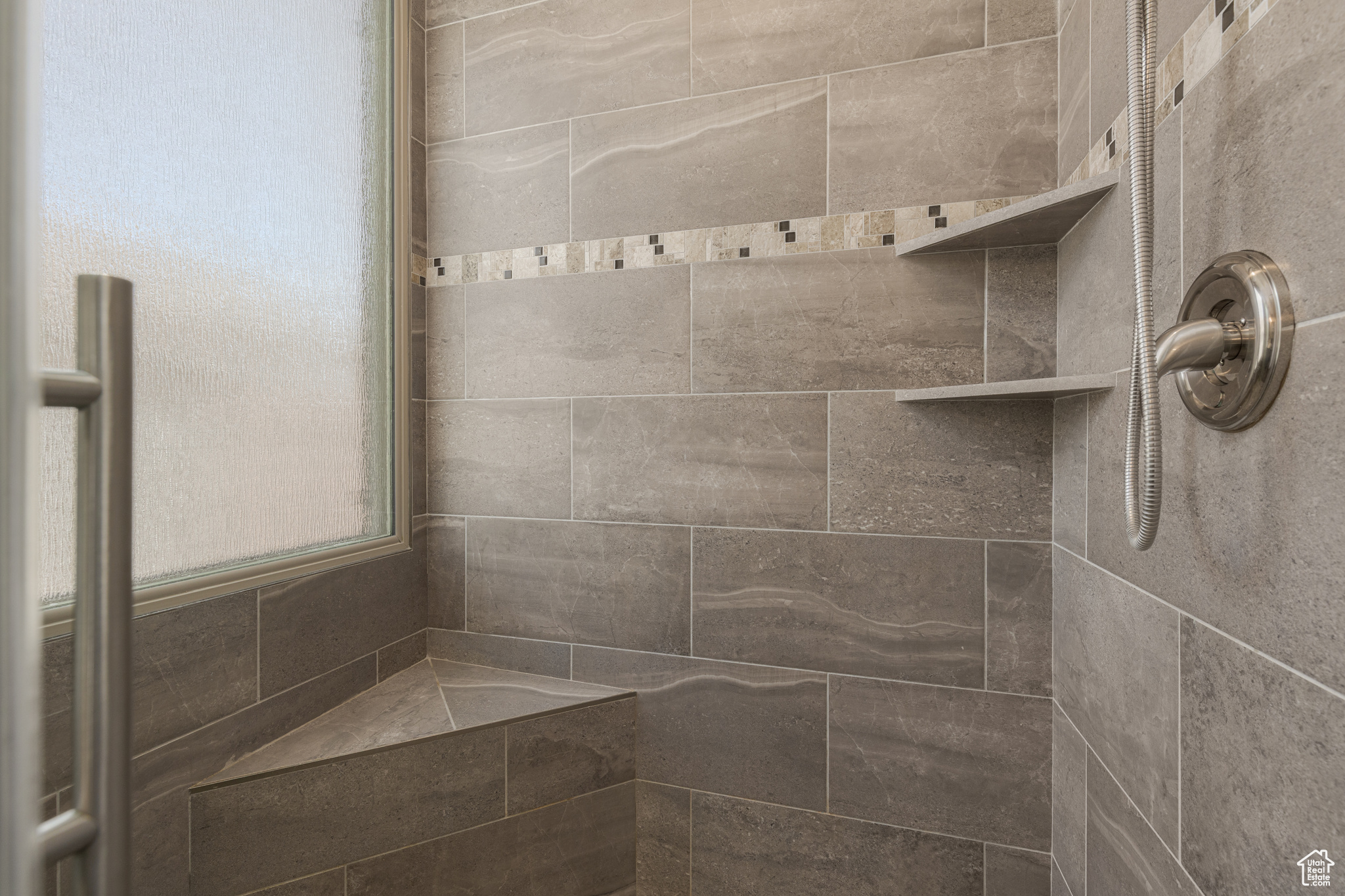 Custom tile in primary bathroom
