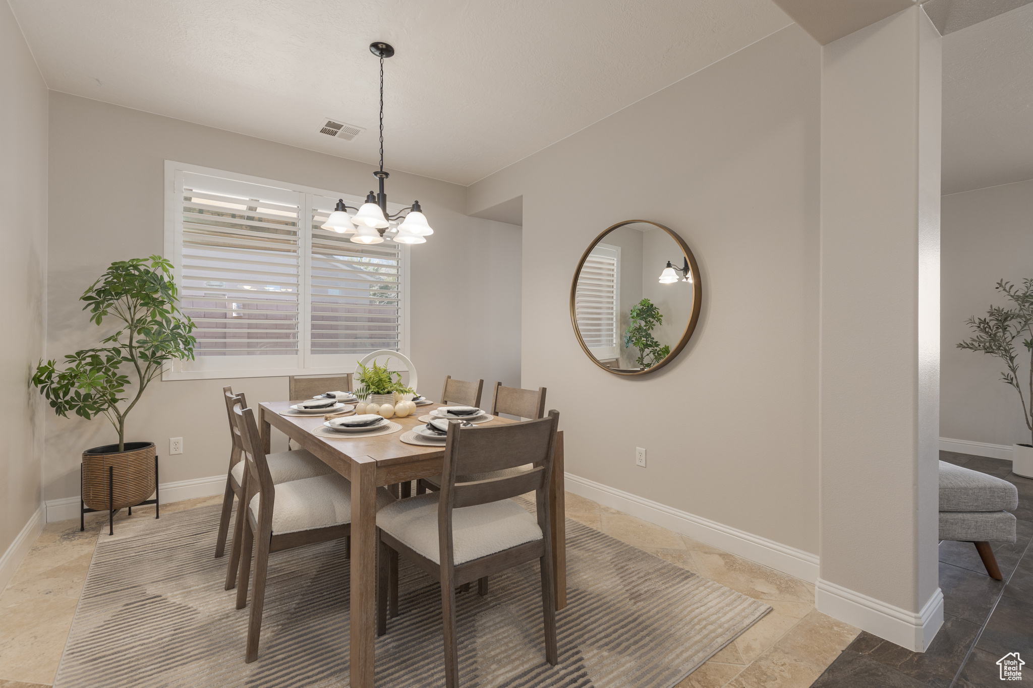 Dining space featuring a chandelier