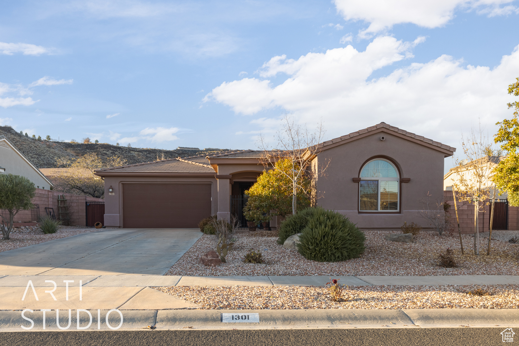 View of front of home featuring a garage