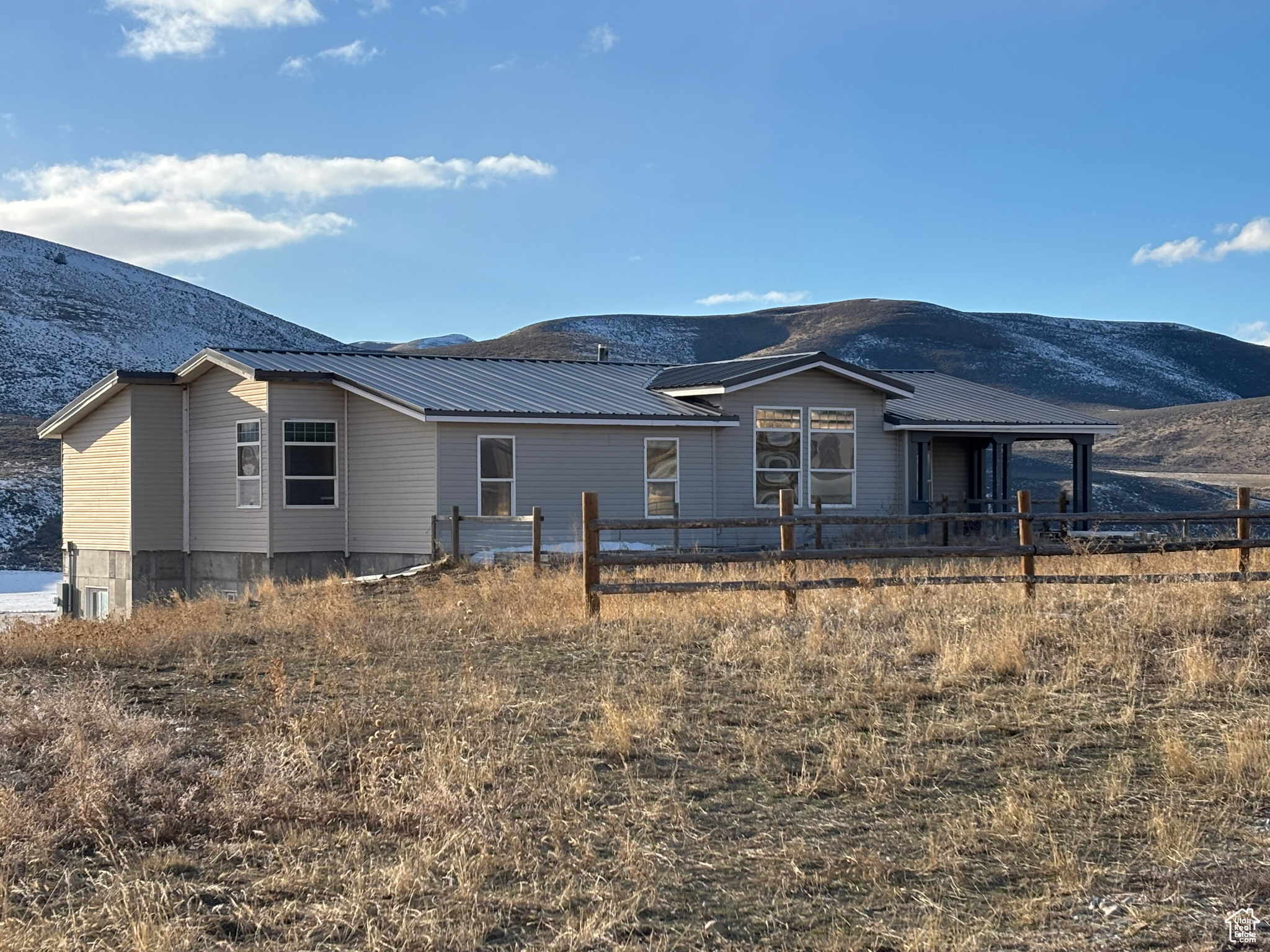 View of front of property with a mountain view