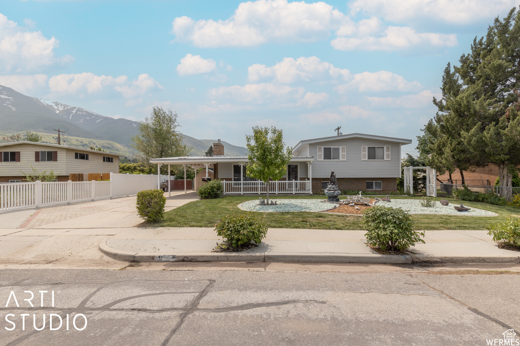 View of front of home featuring a mountain view