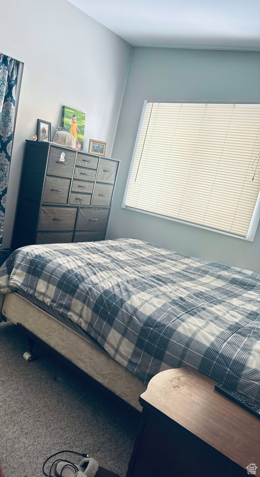 Bedroom featuring carpet flooring