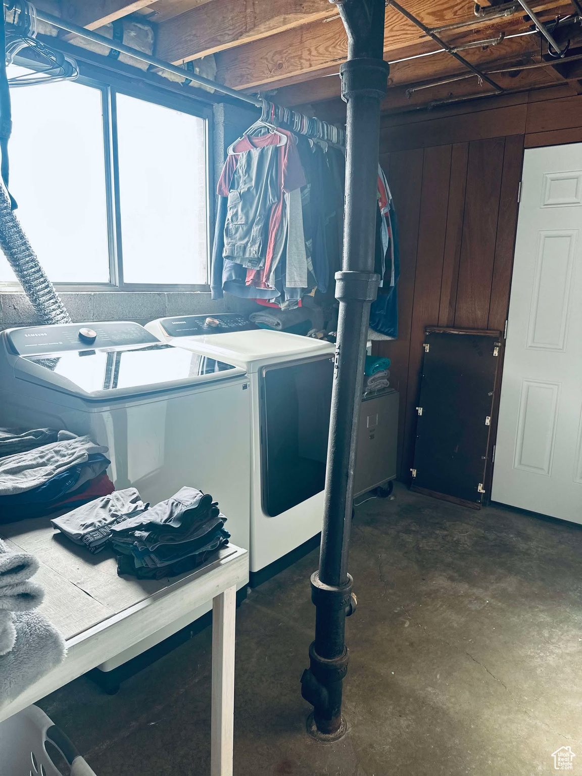 Laundry room with washing machine and dryer