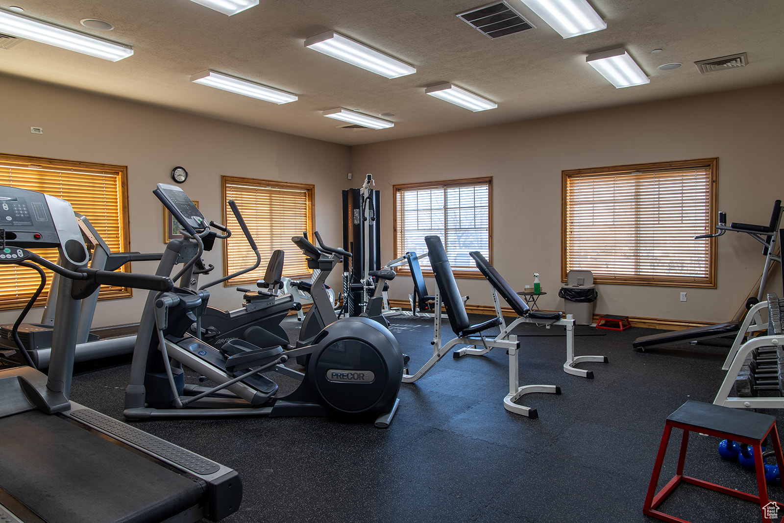 Exercise room with a textured ceiling
