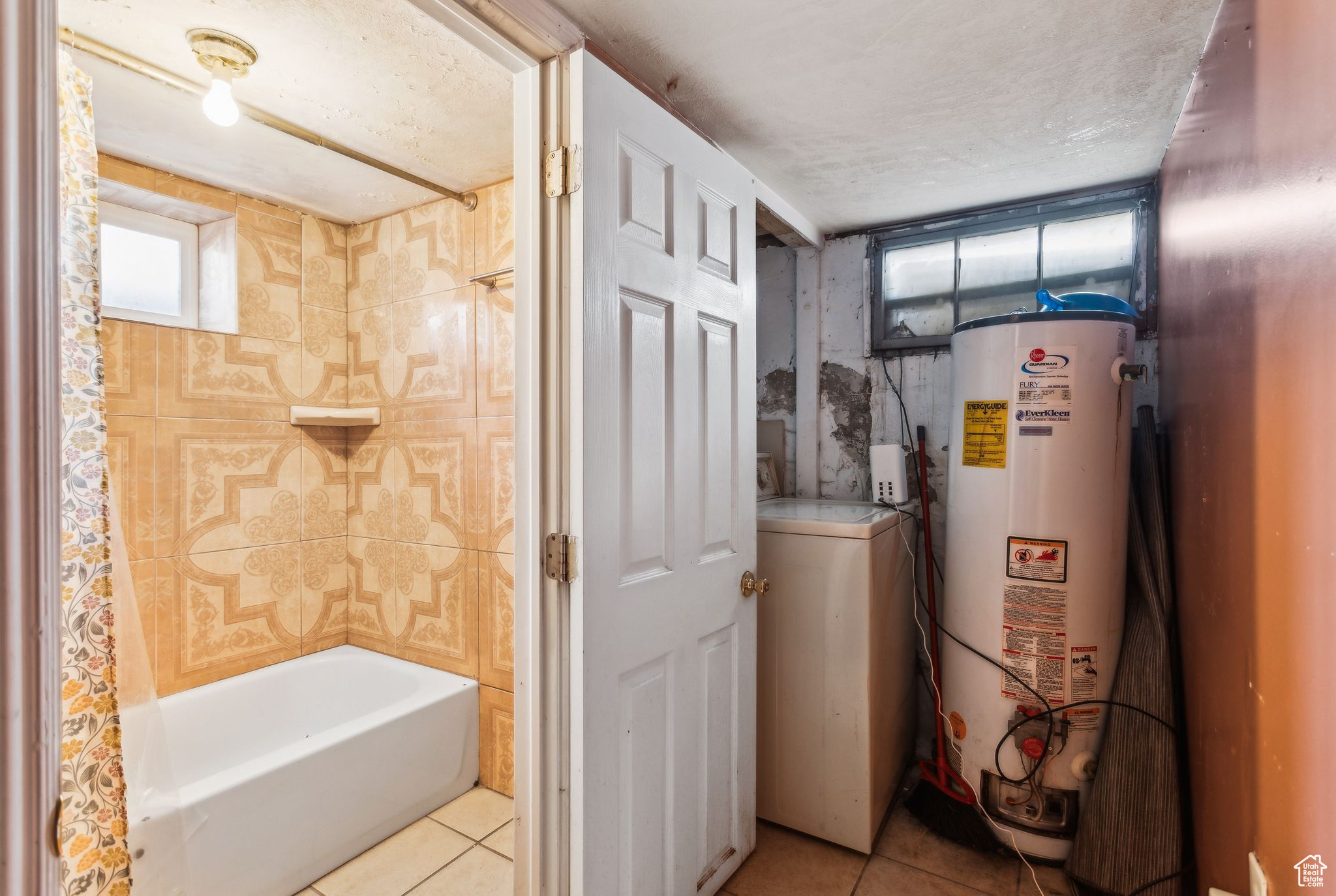 Utilities featuring gas water heater