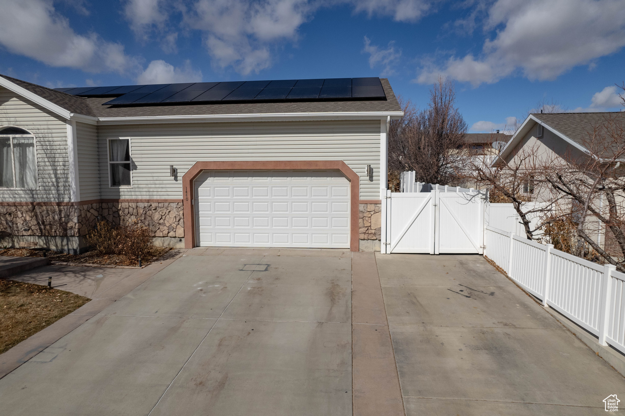 Garage featuring solar panels