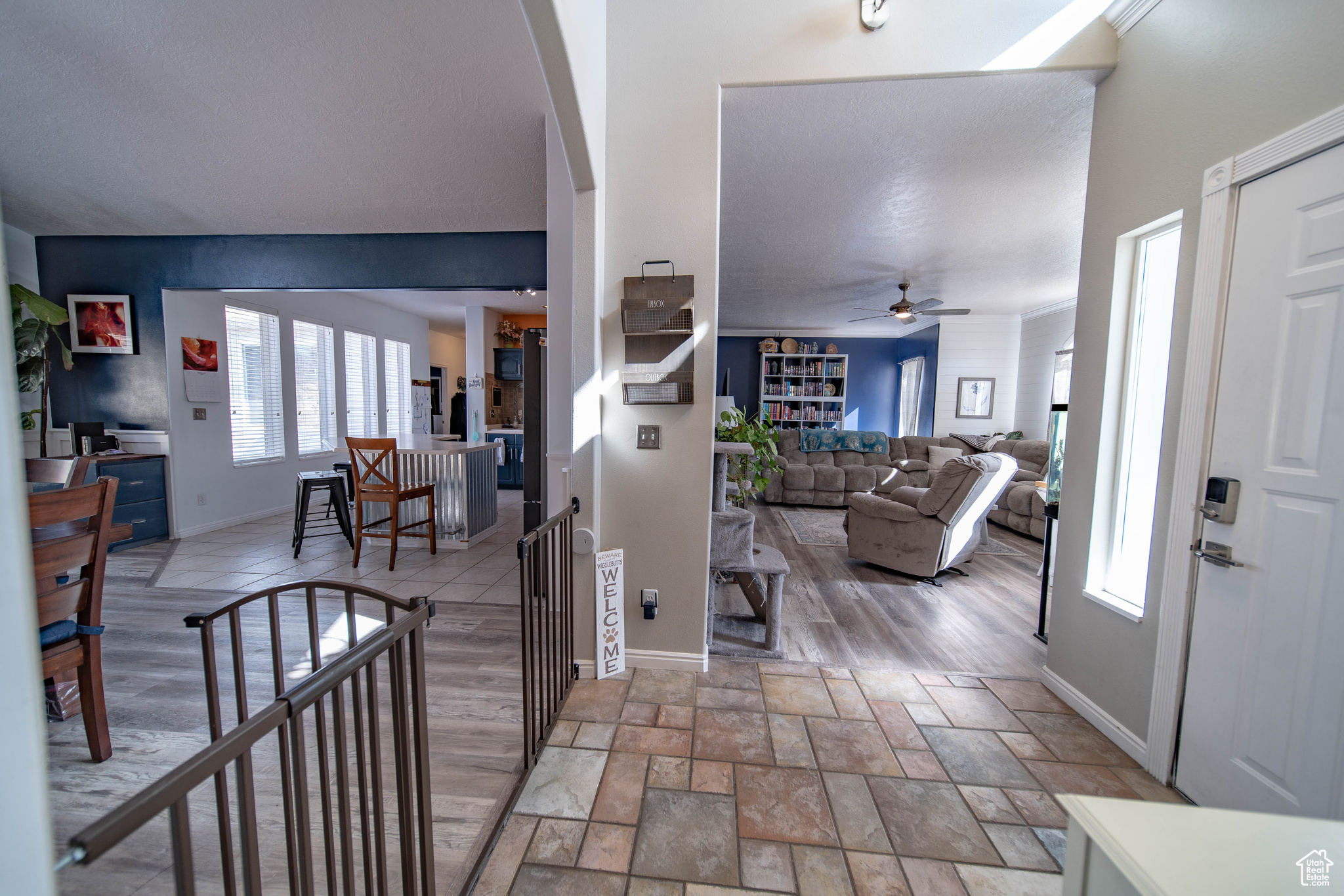Entrance foyer featuring ceiling fan
