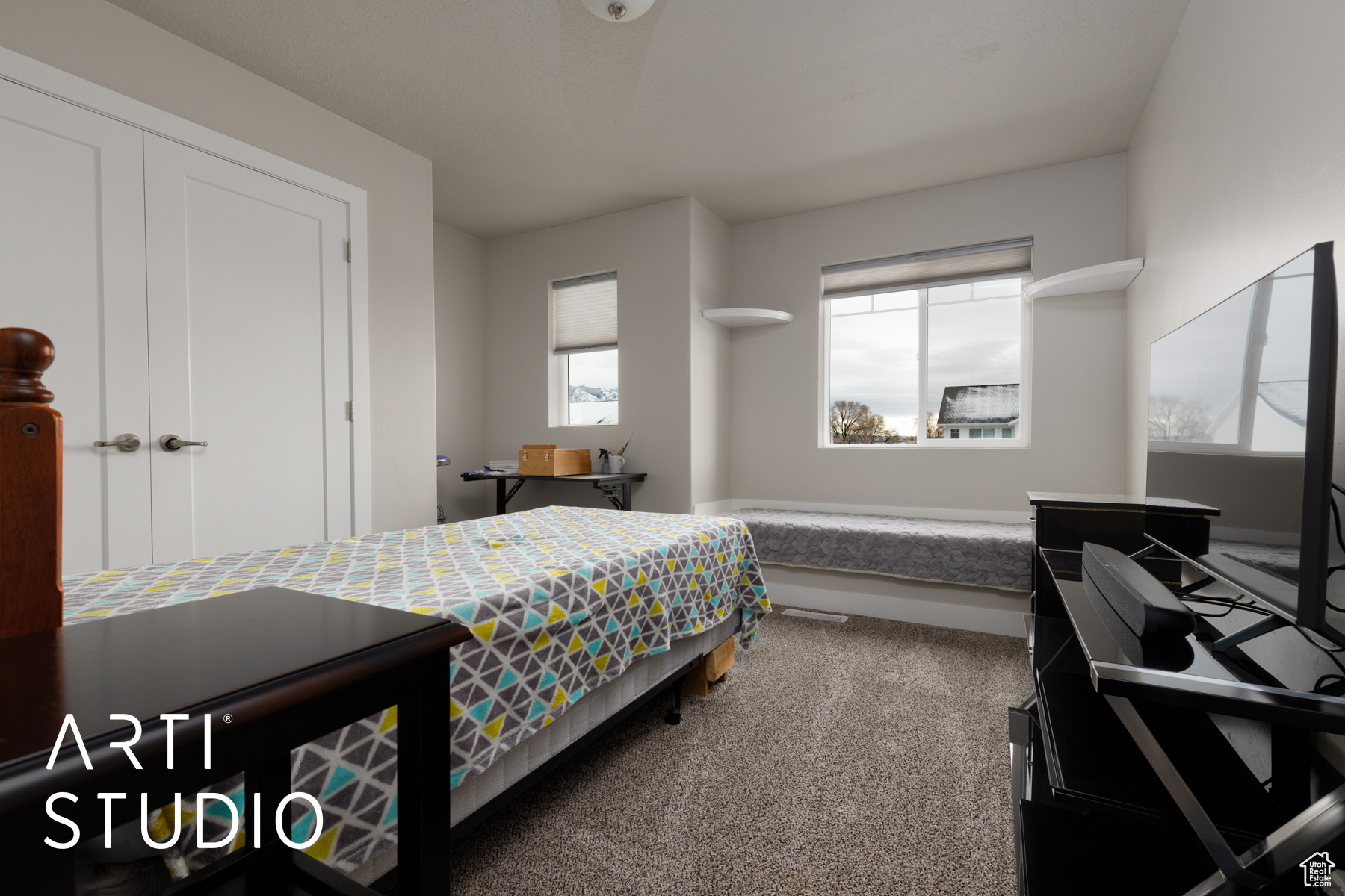 Bedroom with carpet flooring