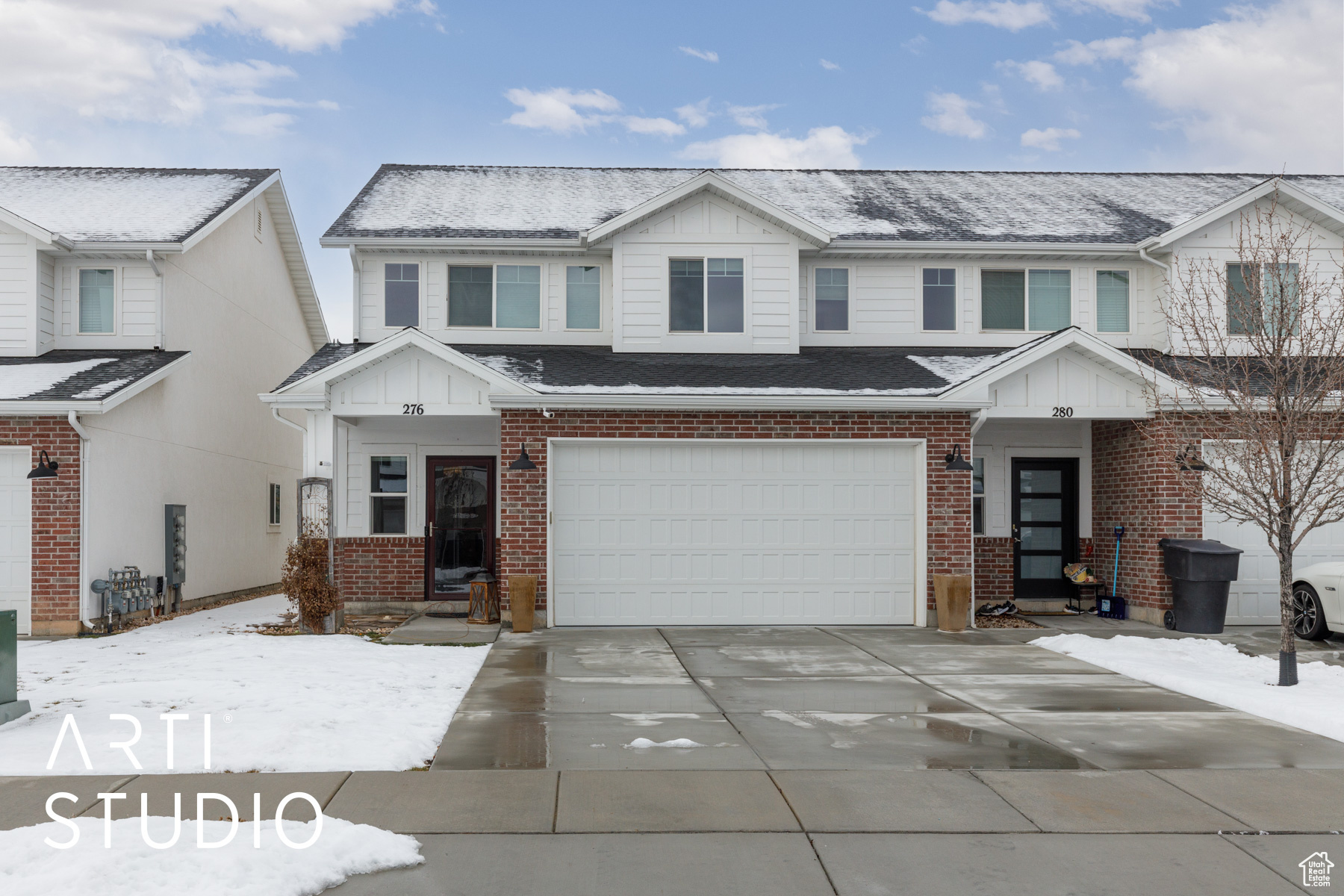 View of front of property featuring a 2-car garage