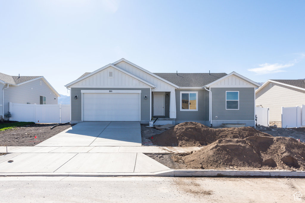 Single story home featuring a garage