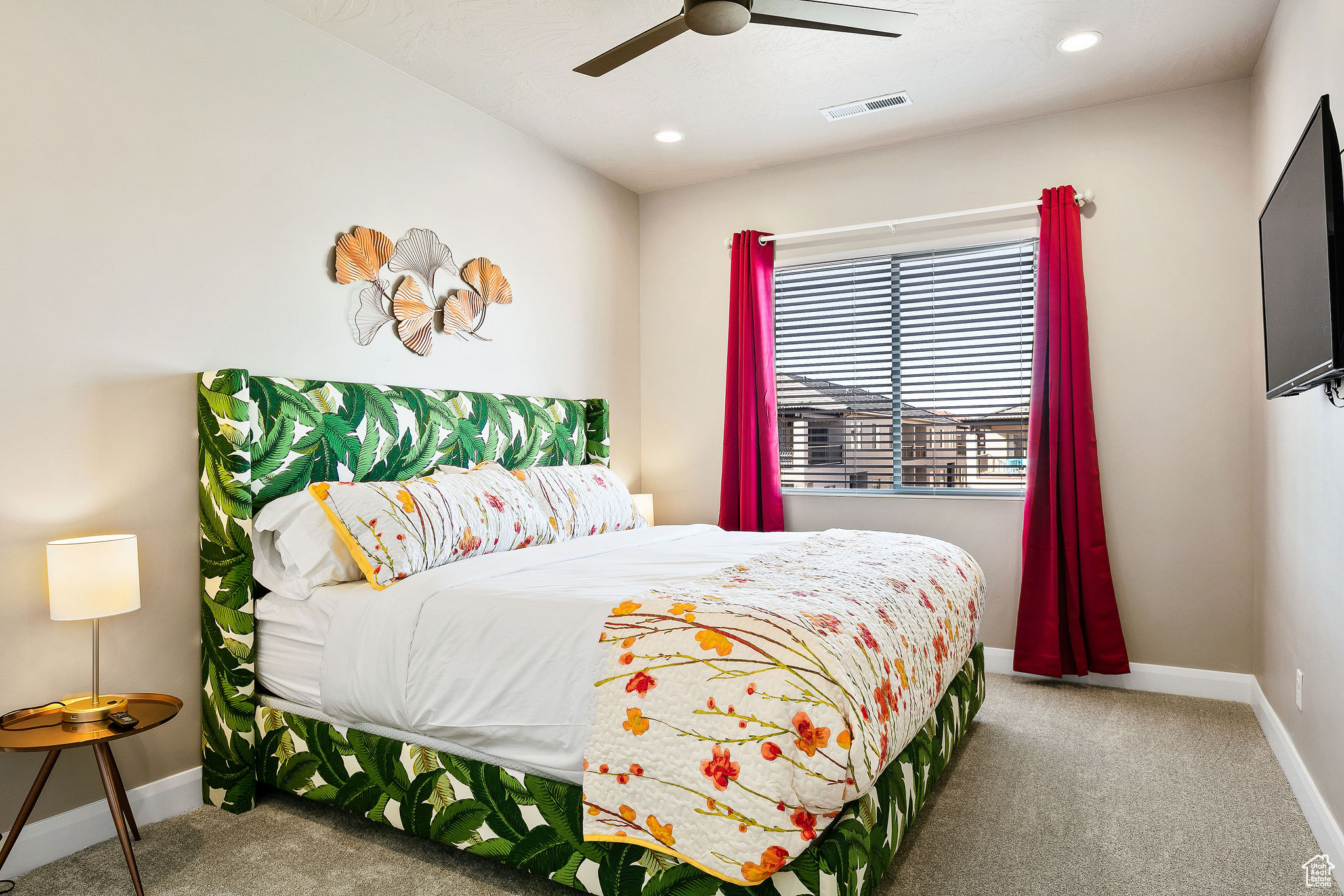 Bedroom with carpet flooring and ceiling fan