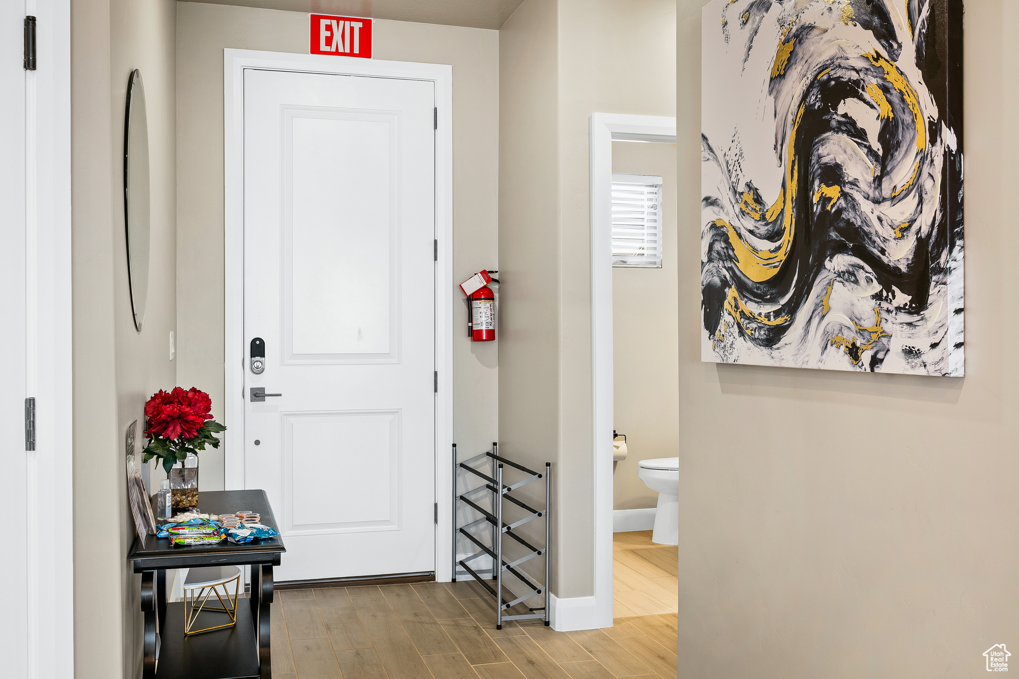 Entrance foyer featuring light wood-type flooring