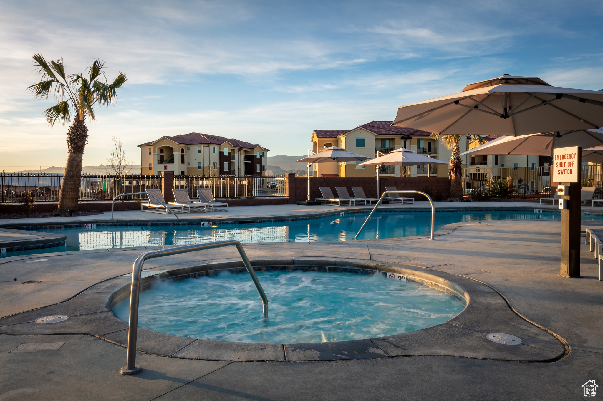 View of pool with a community hot tub
