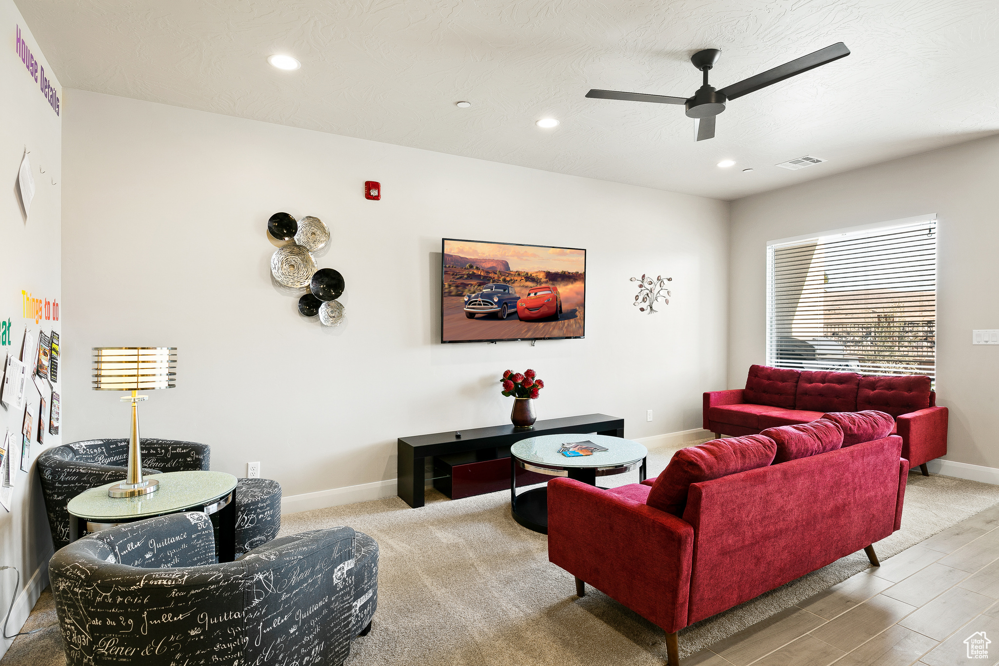 Living room featuring ceiling fan