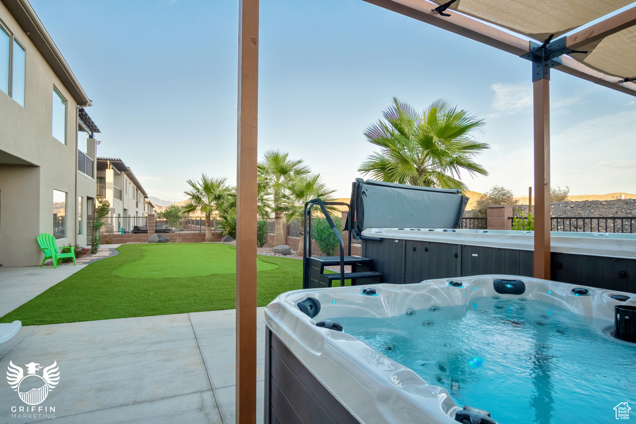 View of patio featuring a hot tub