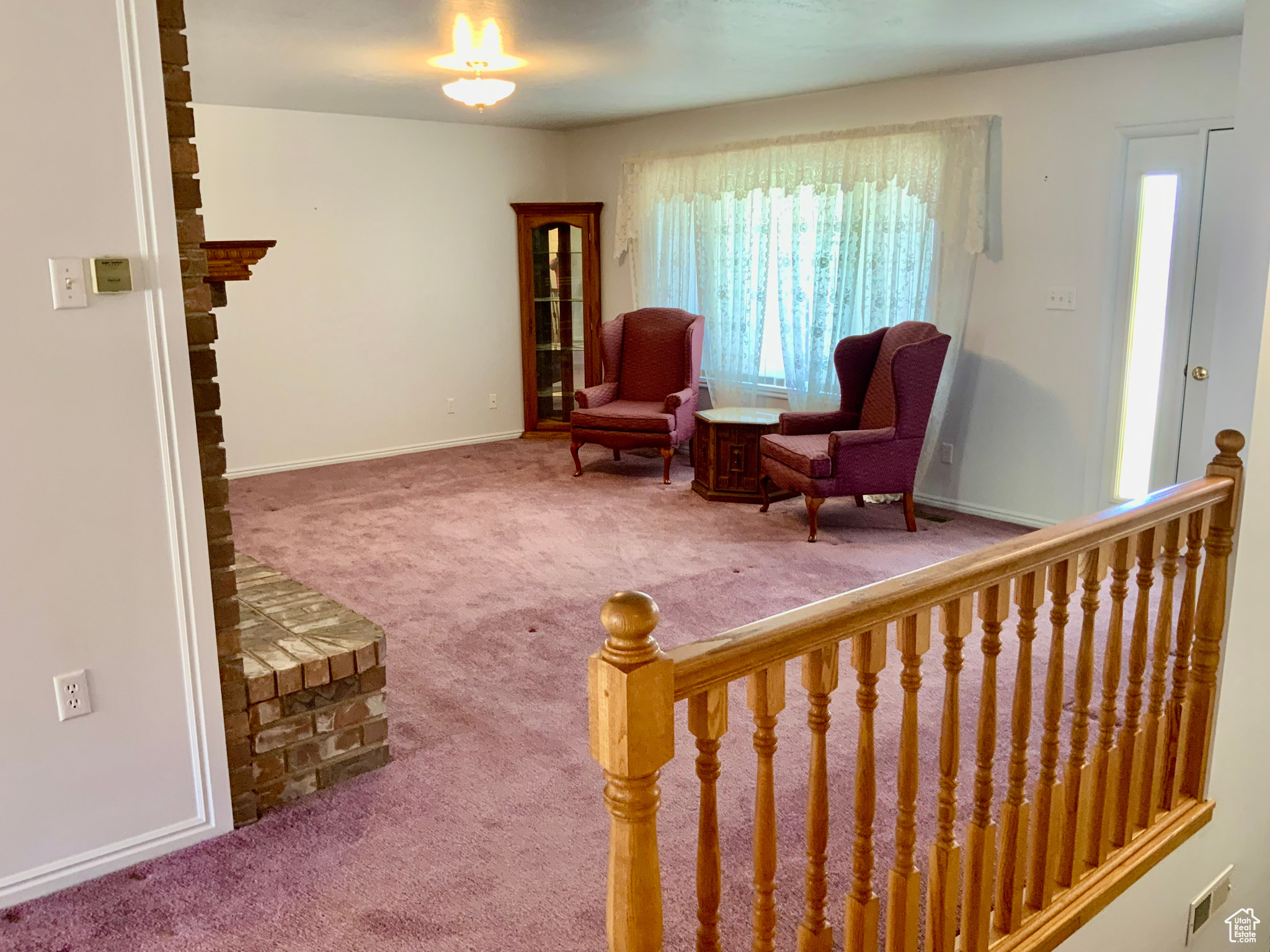 Living area featuring carpet