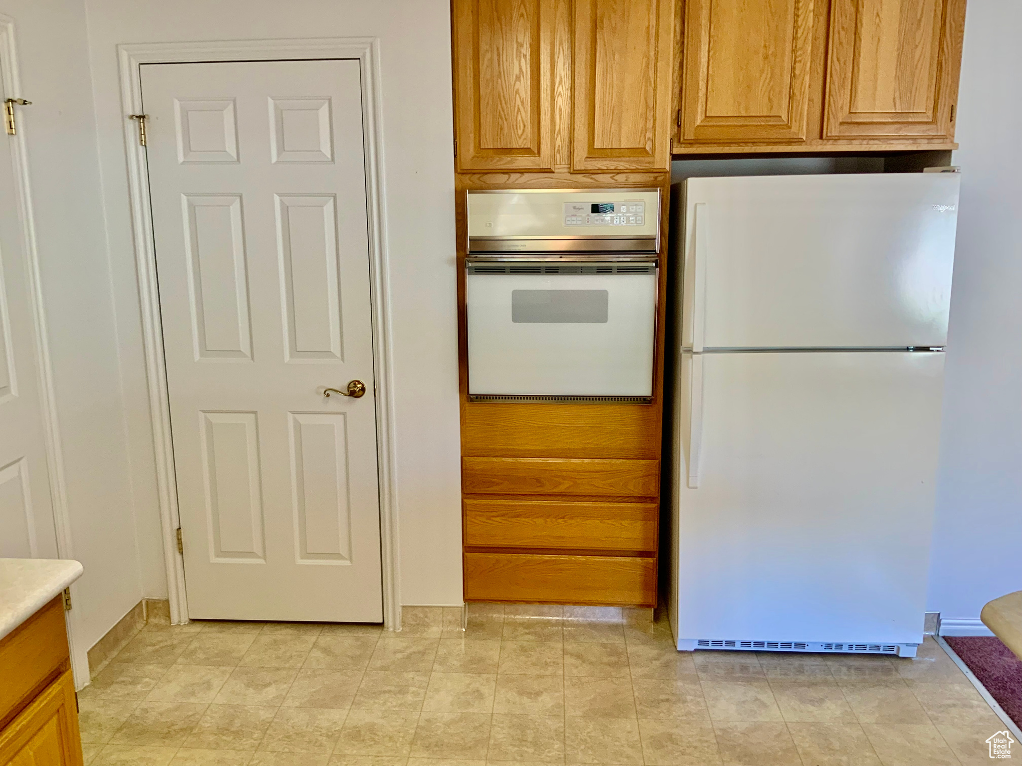 Kitchen with white appliances