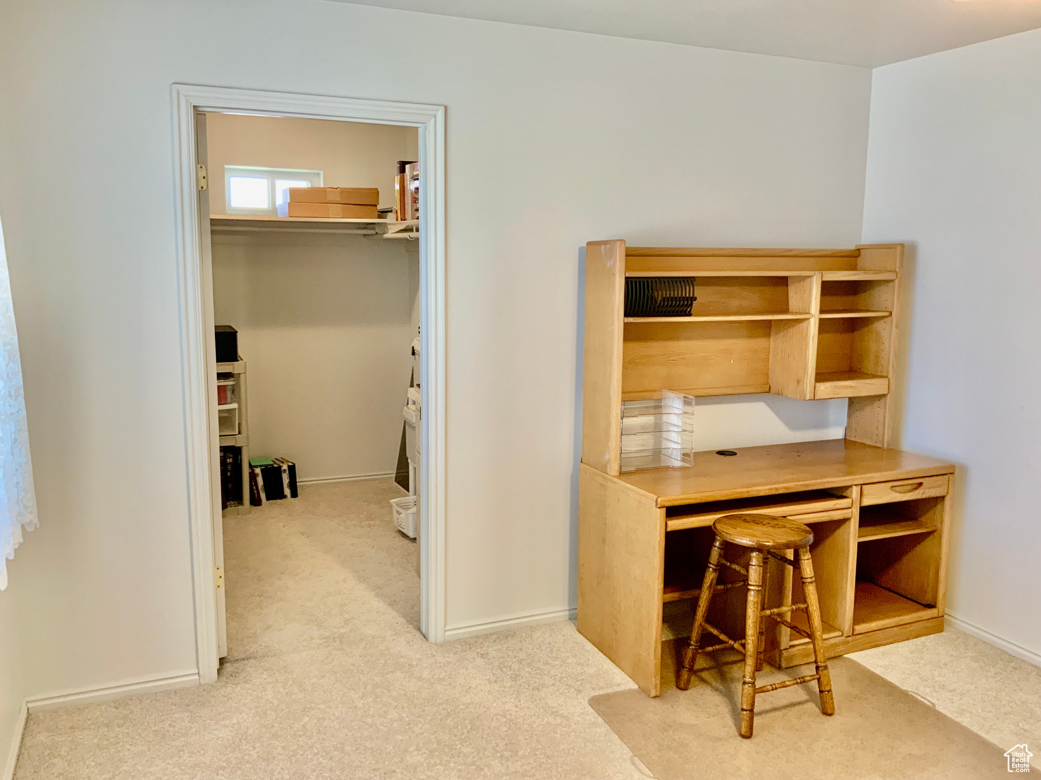 Office area with light colored carpet