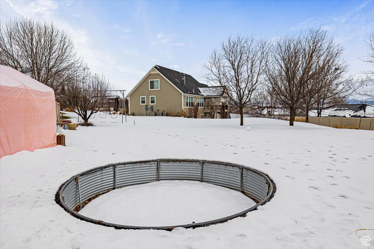 In ground trampoline with extended yard