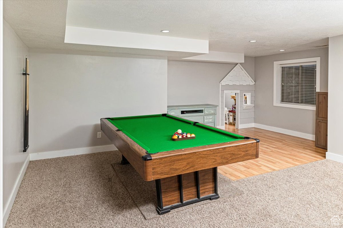 Recreation room with pool table, carpet flooring, and a play room