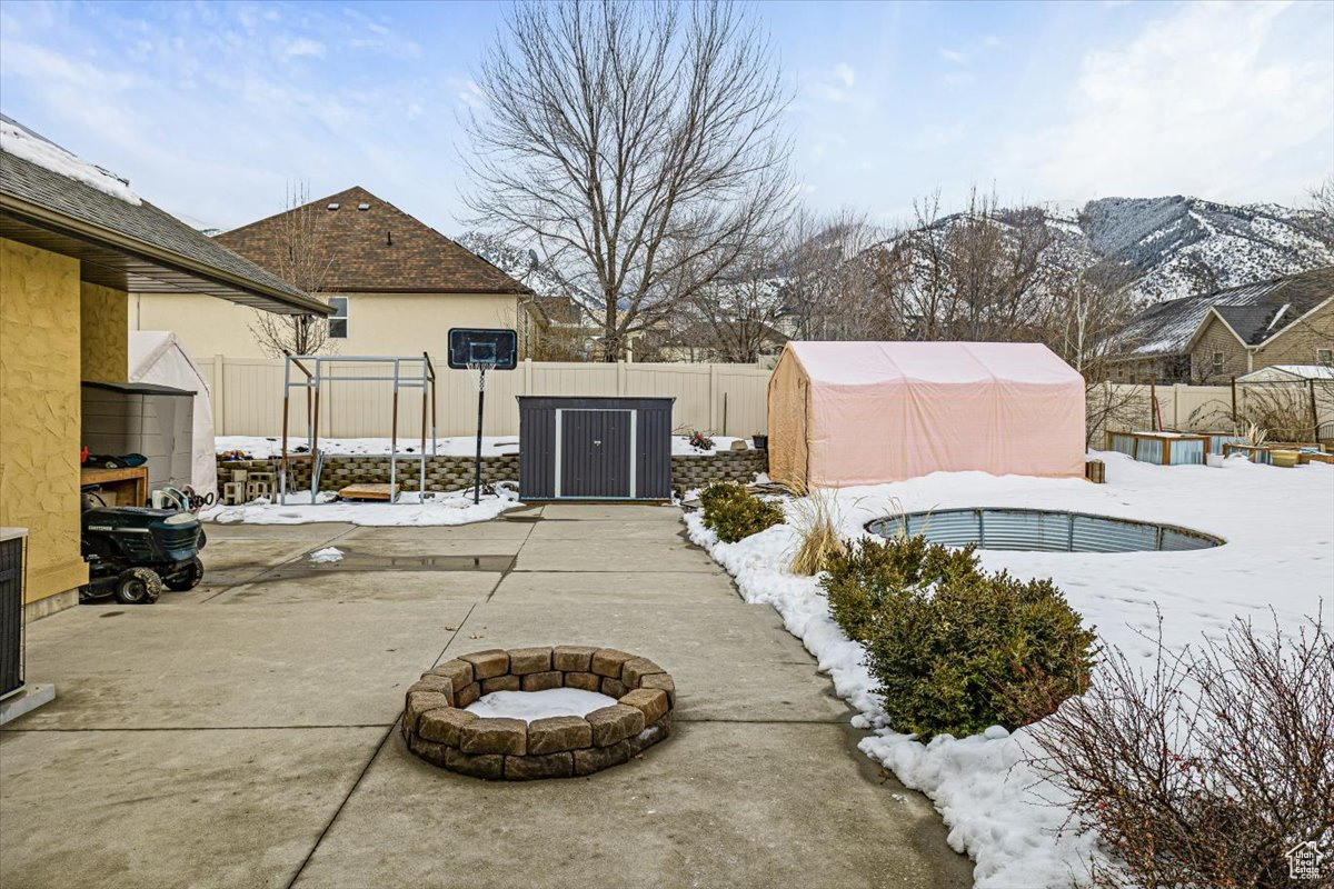 Extended patio, fire pit and in ground trampoline