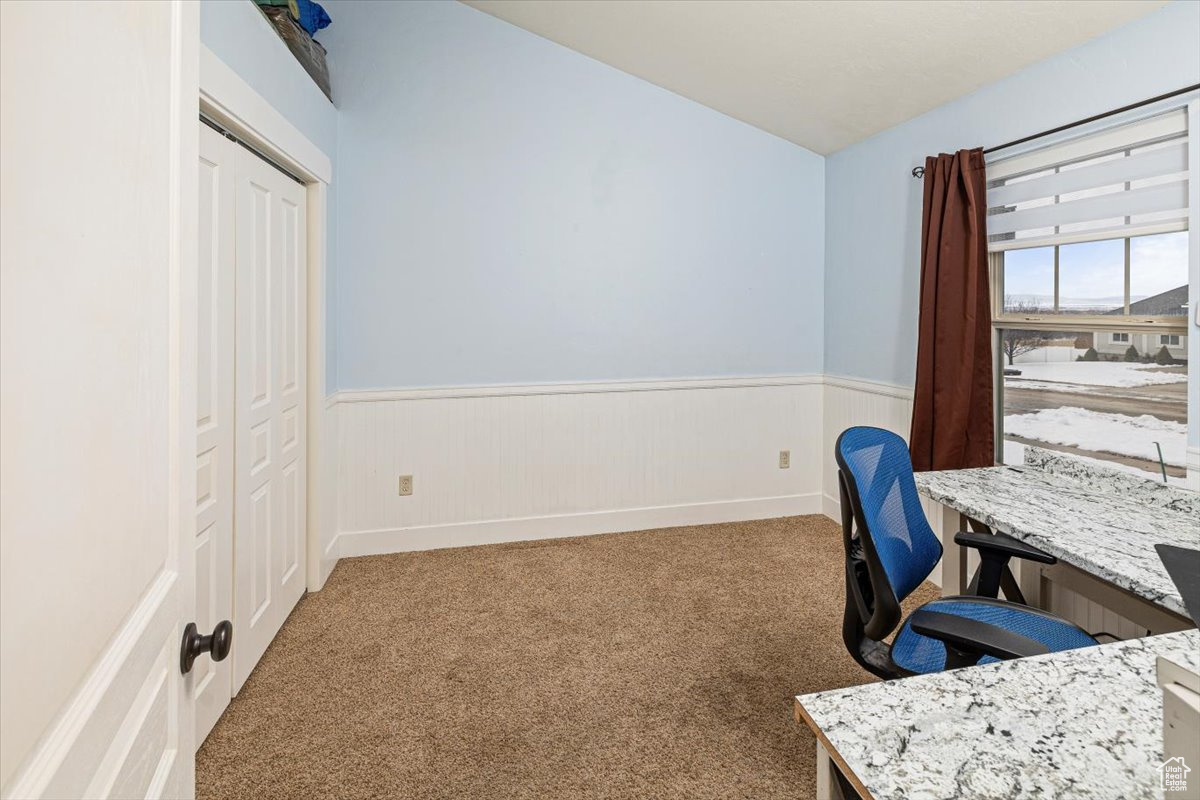 Office area featuring carpet flooring