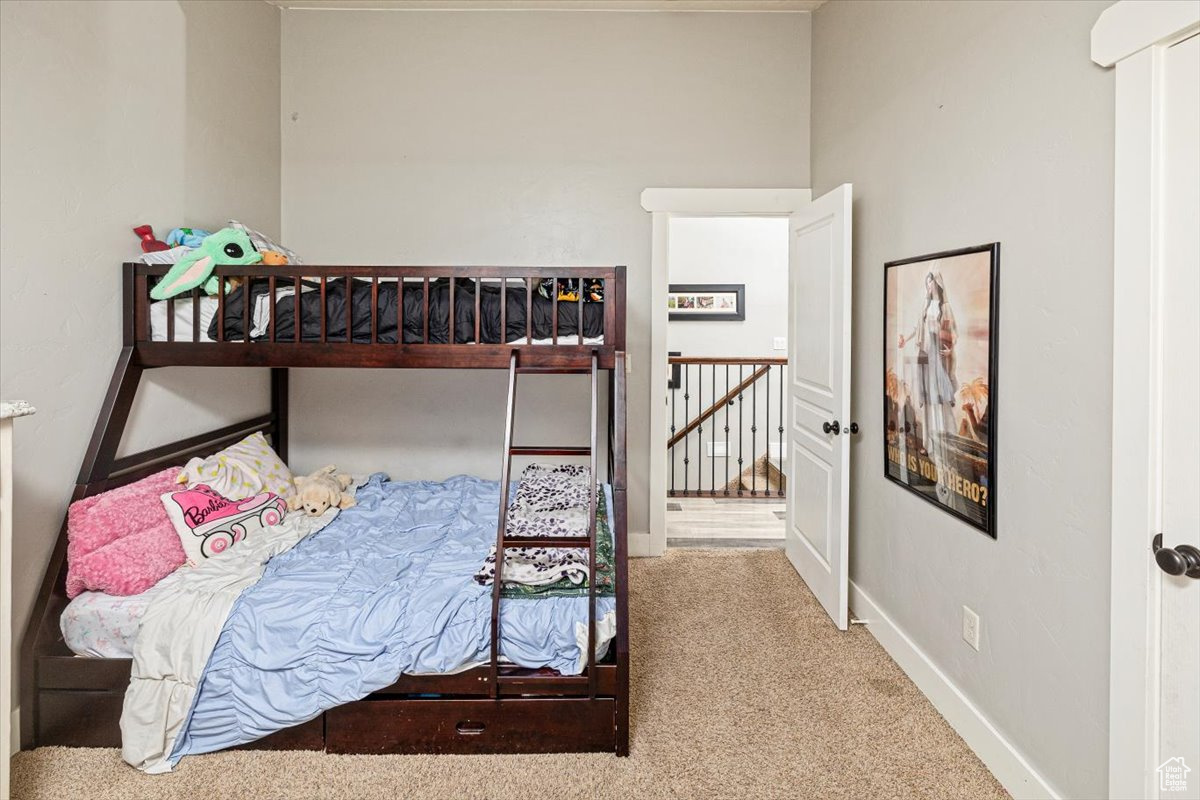 Bedroom featuring carpet