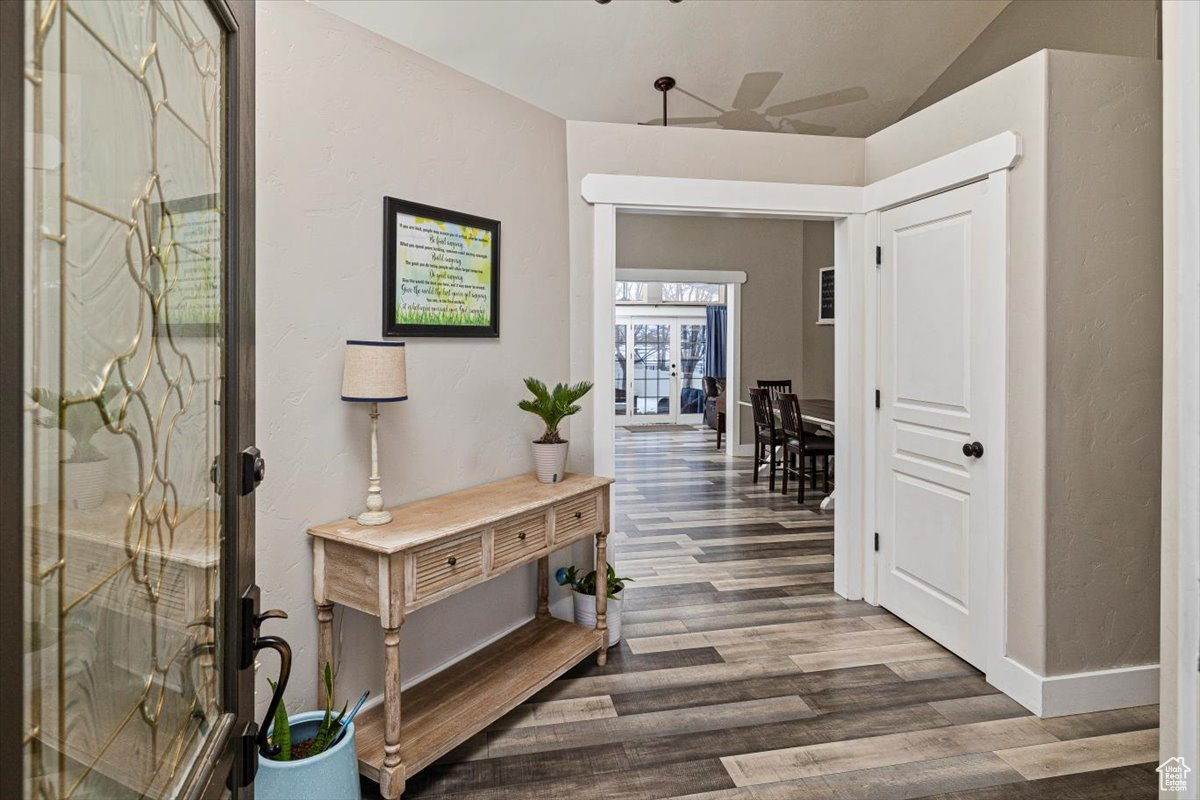 Entrance foyer featuring dark hardwood / wood-style flooring
