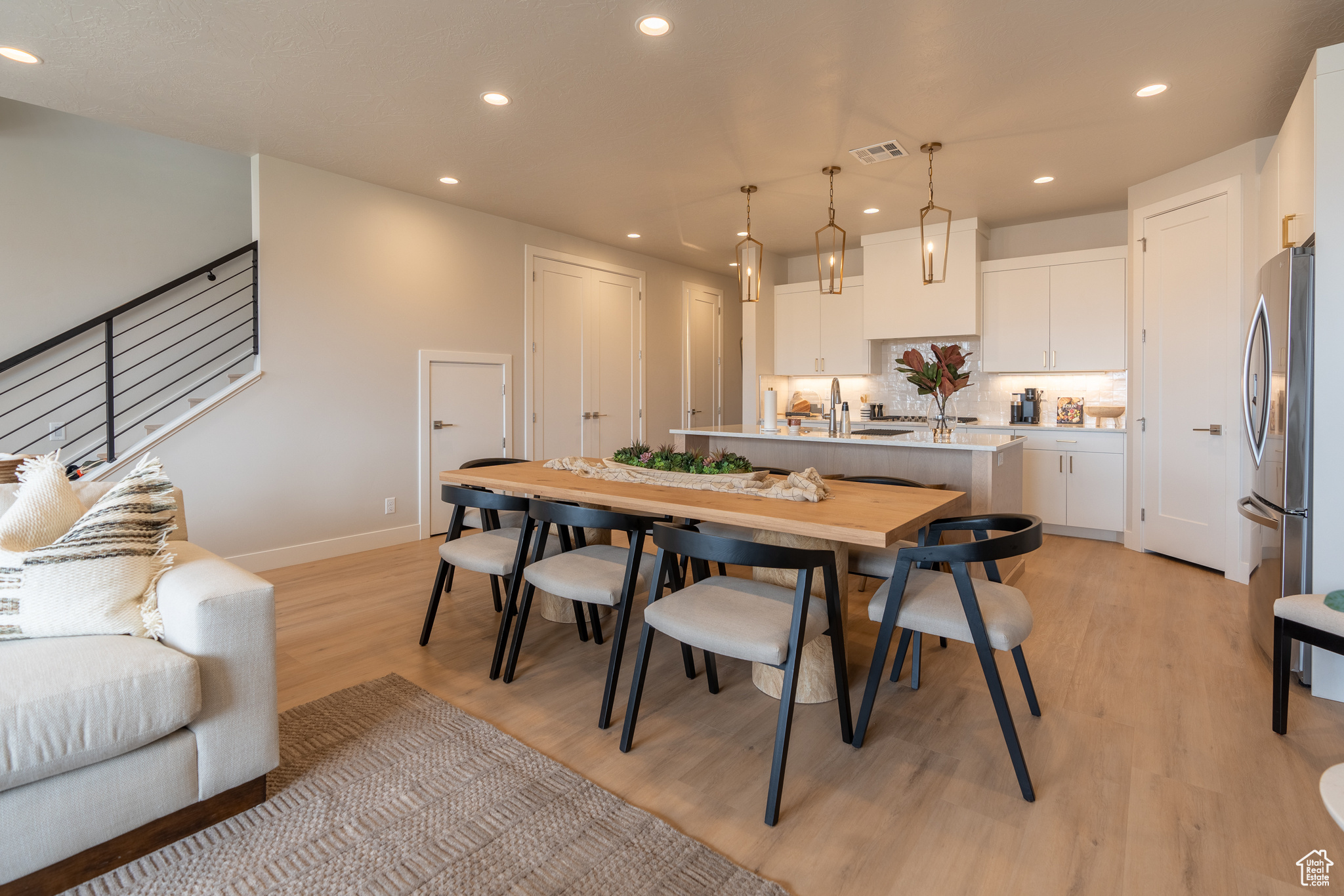 Dining room featuring light hardwood / wood-style floors and sink