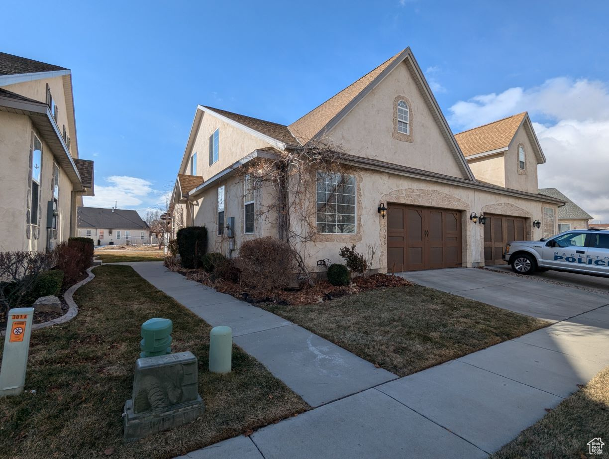 View of home's exterior featuring a yard
