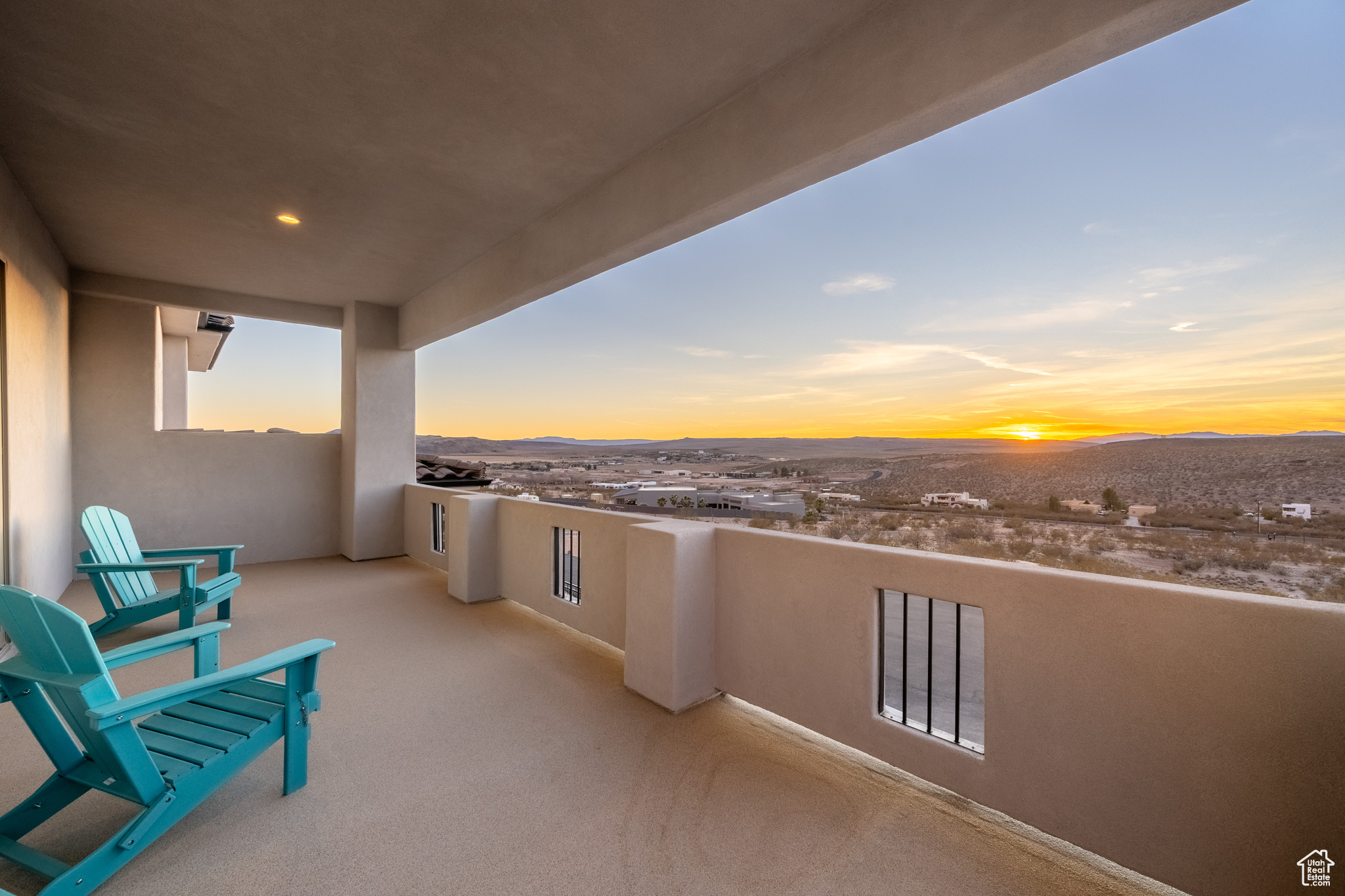 View of balcony at dusk