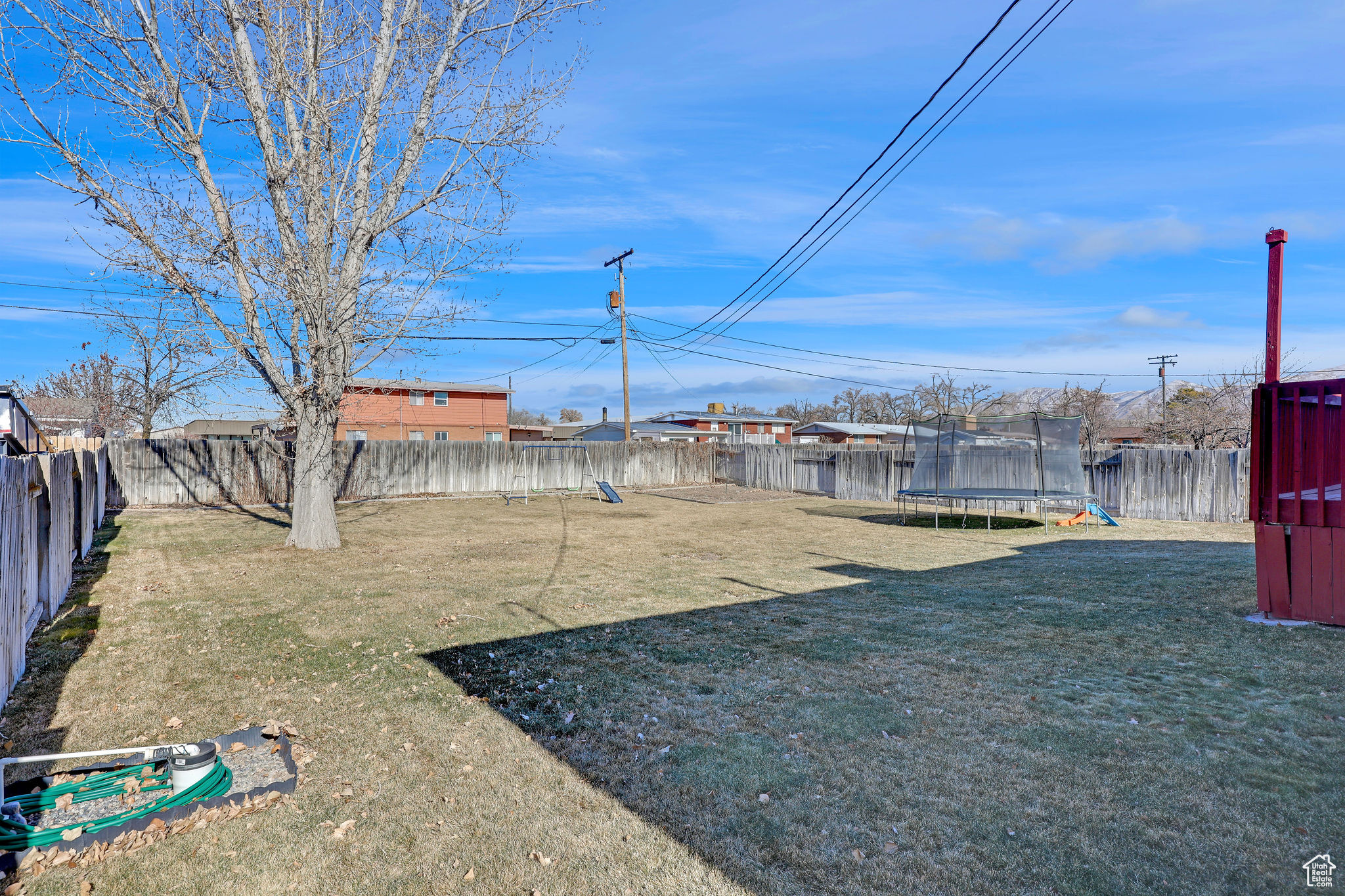 View of the fenced in yard