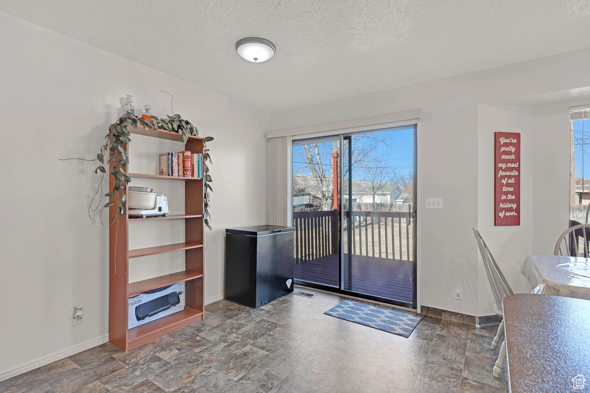 Sliding door off kitchen to the back deck