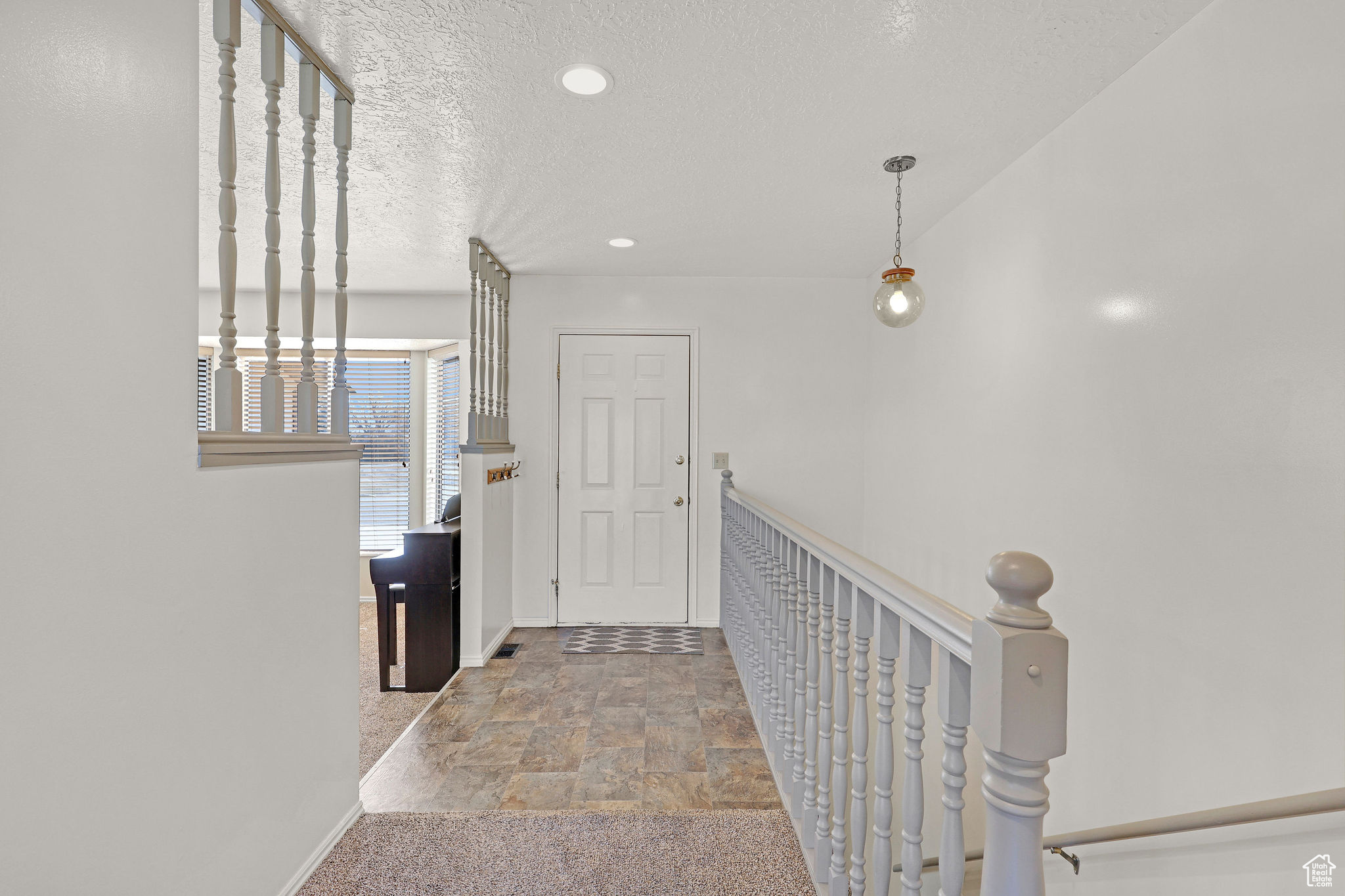 Entry way with living room to the left