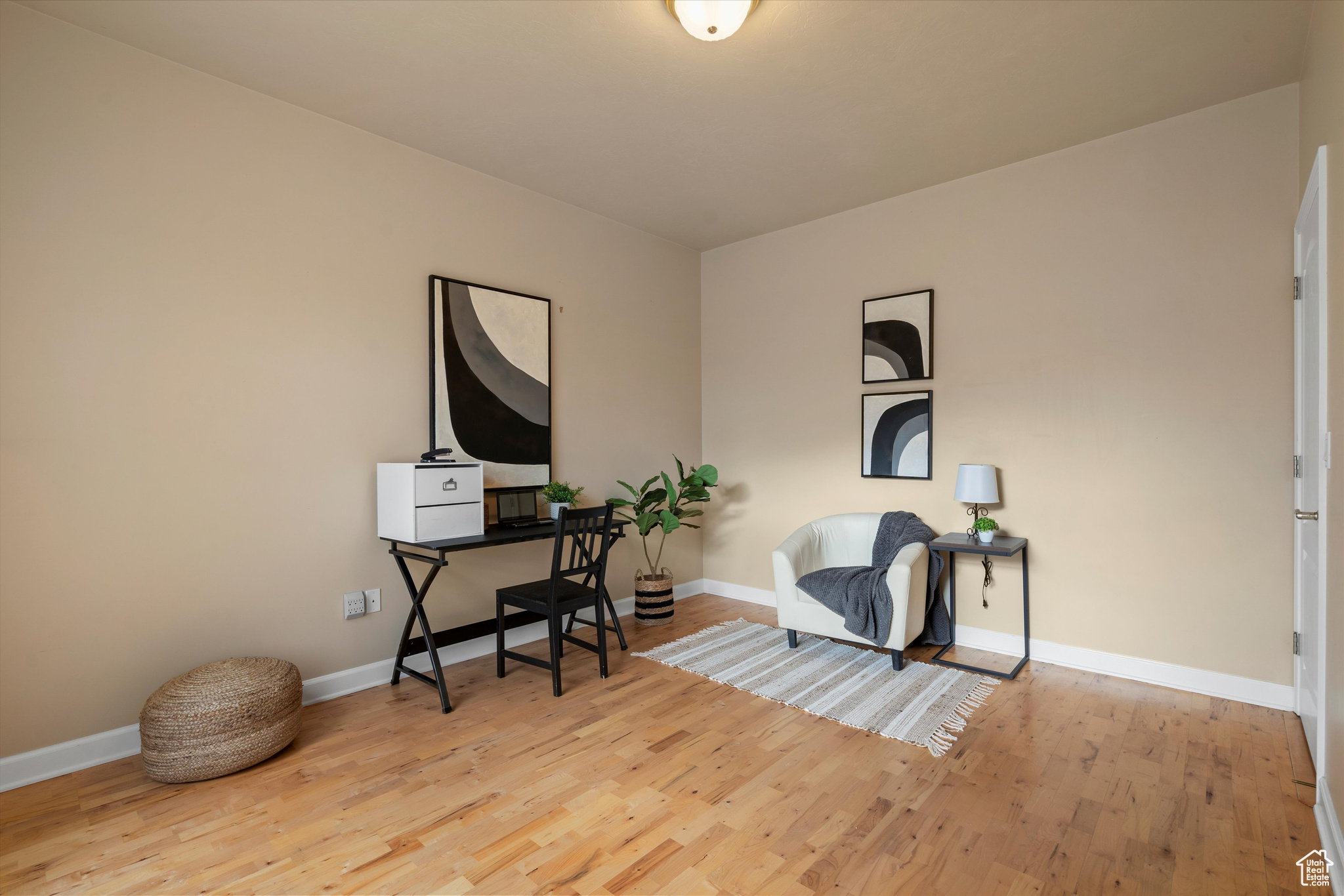 Office space with light wood-type flooring