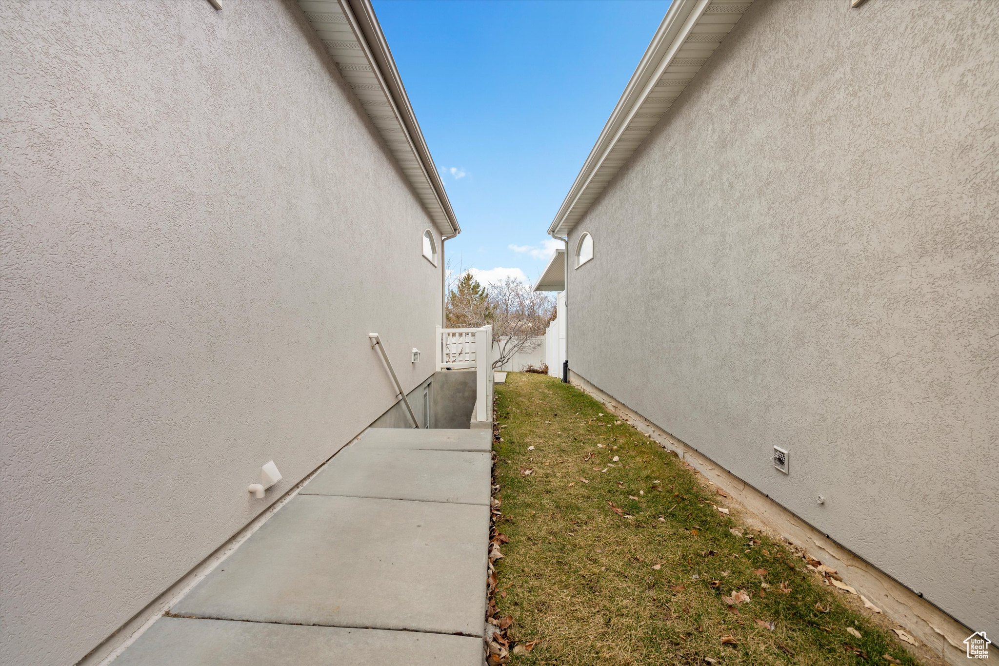 A view of the basement entrance on the side of the home