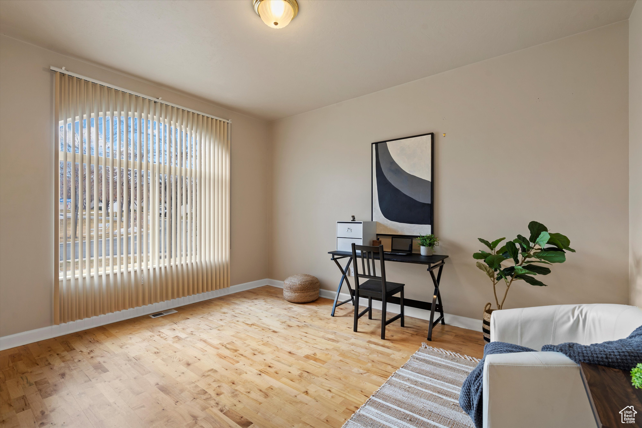 Office space featuring hardwood / wood-style floors