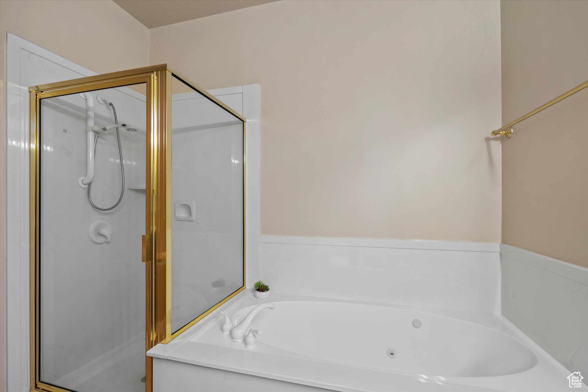 Bathroom featuring independent shower and bath