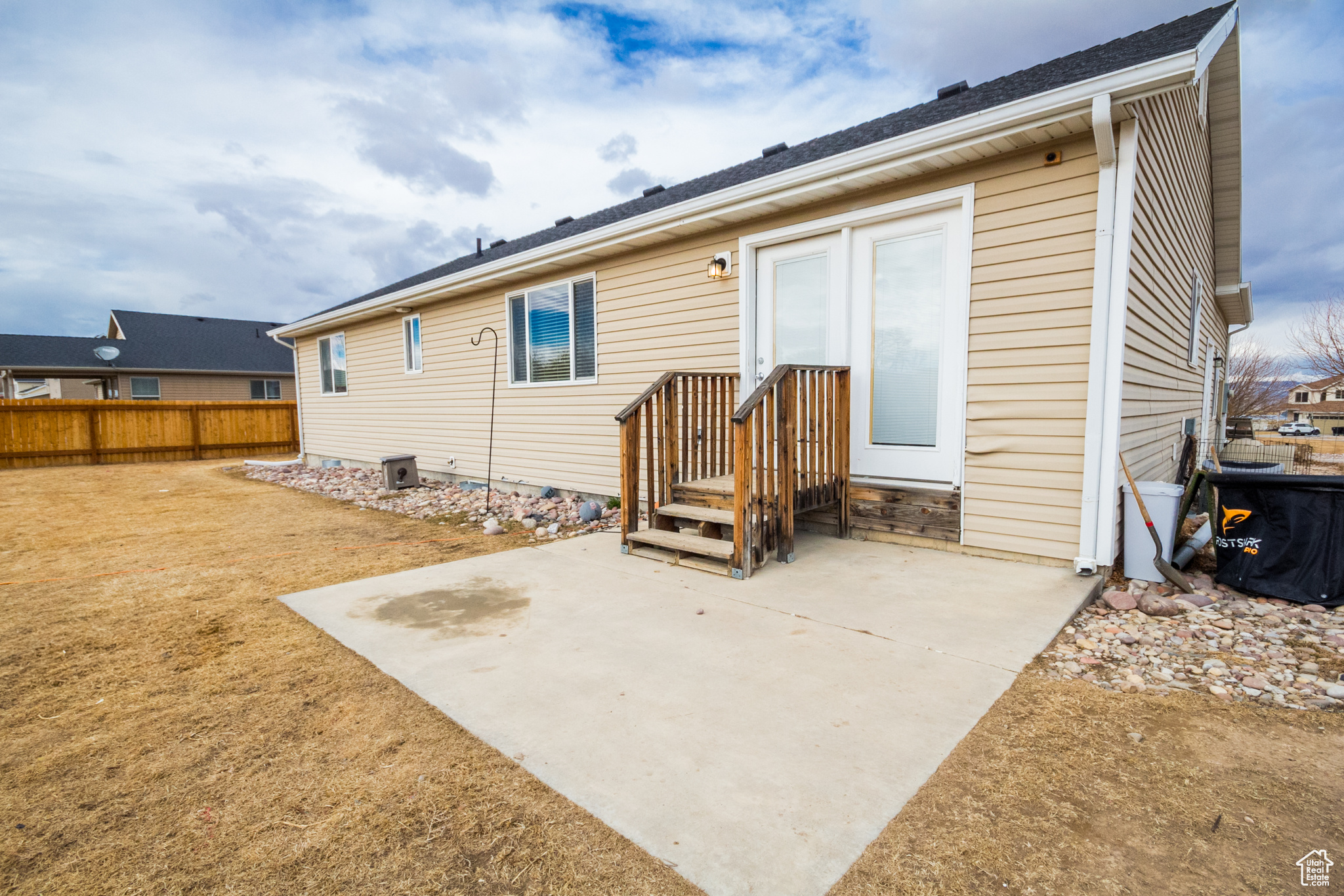 Back of house with a patio area