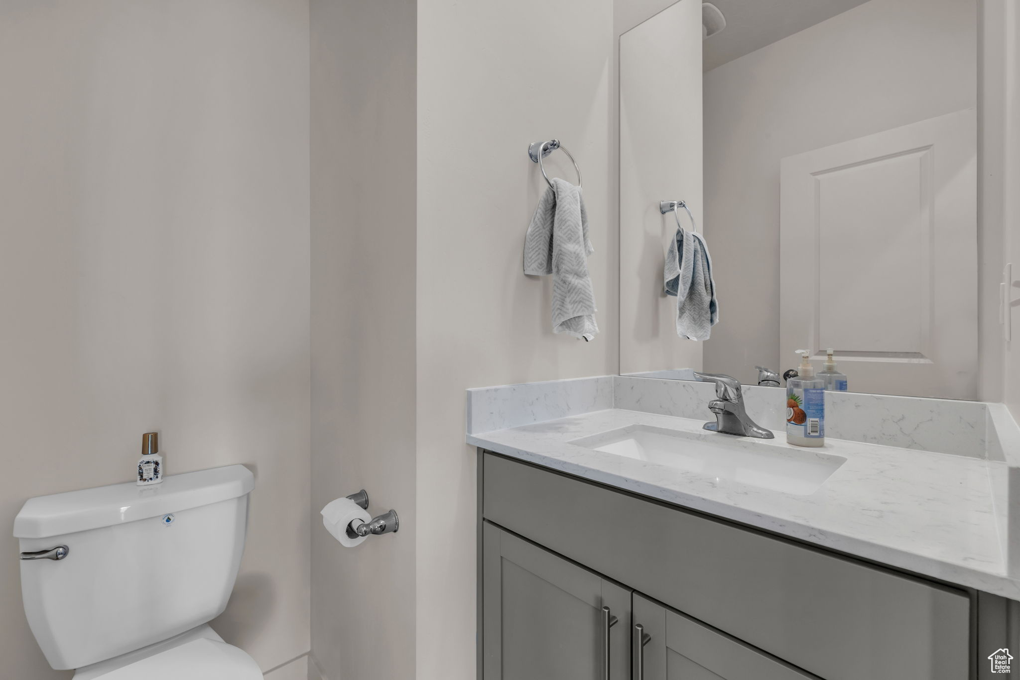 Bathroom featuring toilet and vanity