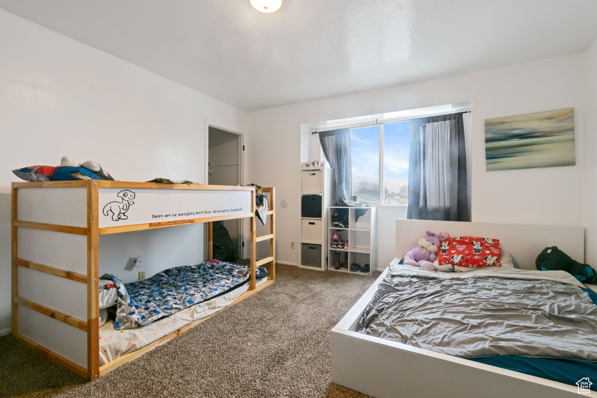 Bedroom featuring carpet flooring