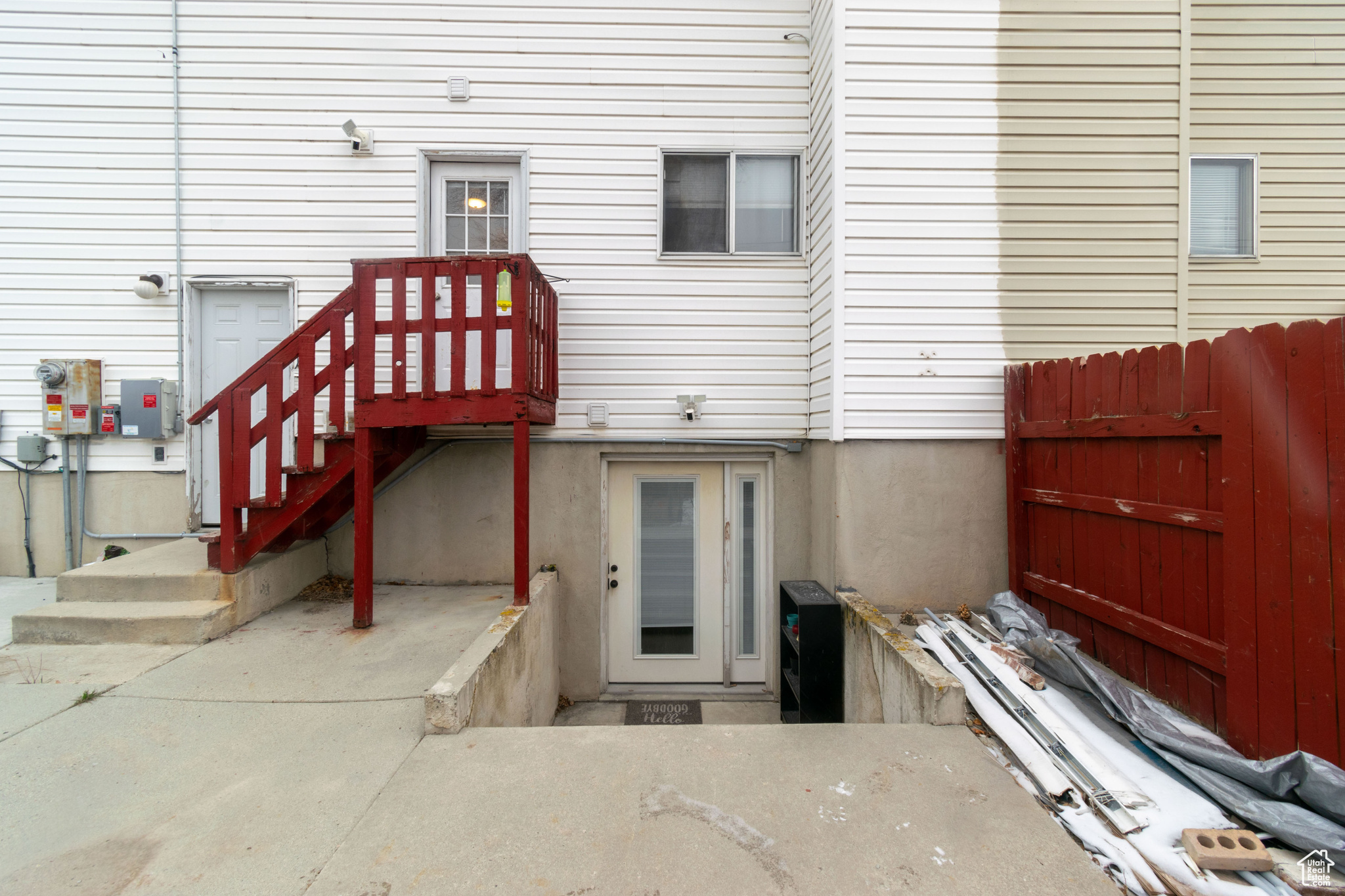 Doorway to property with fence