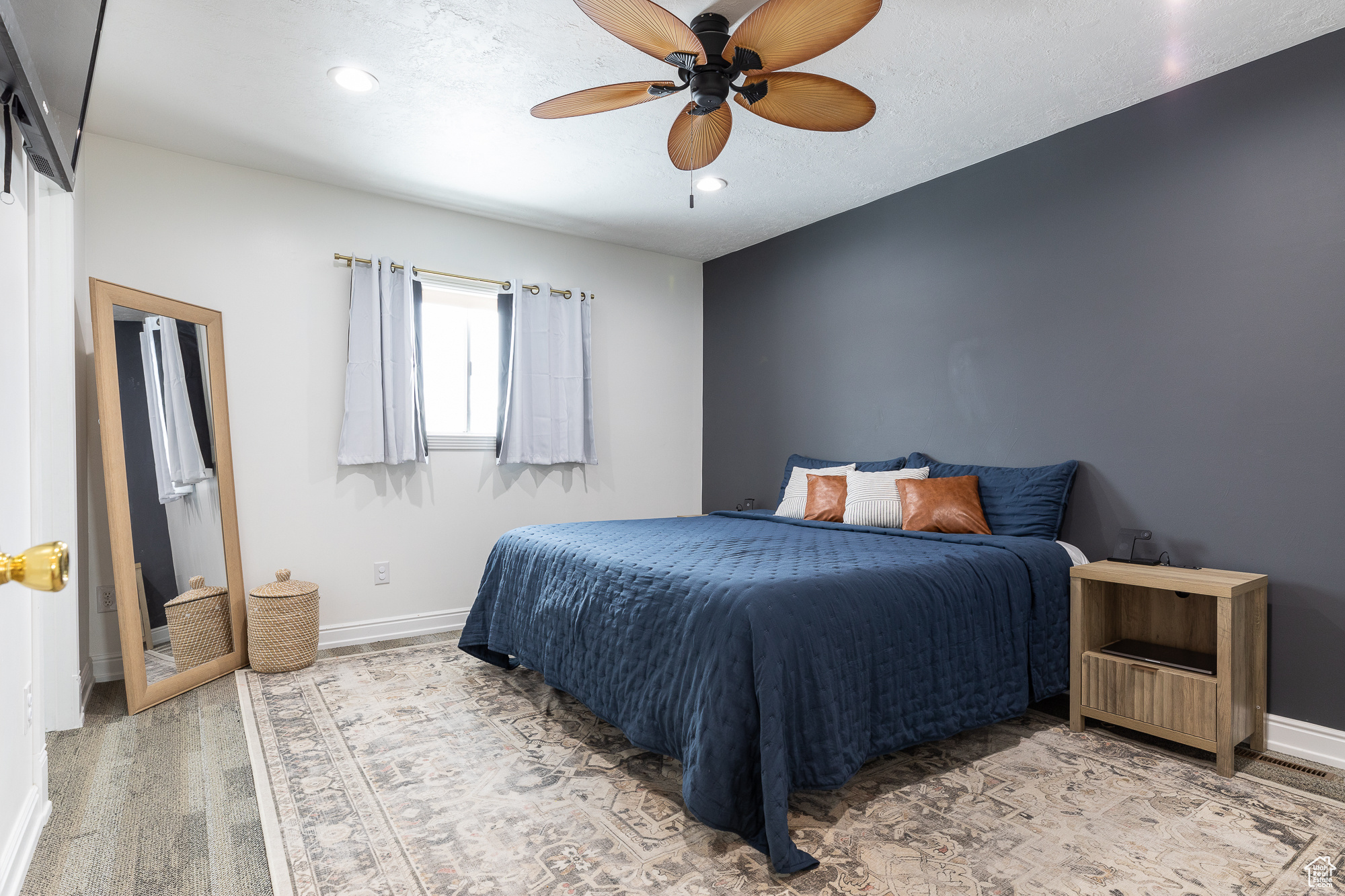 Bedroom with ceiling fan, baseboards, and recessed lighting