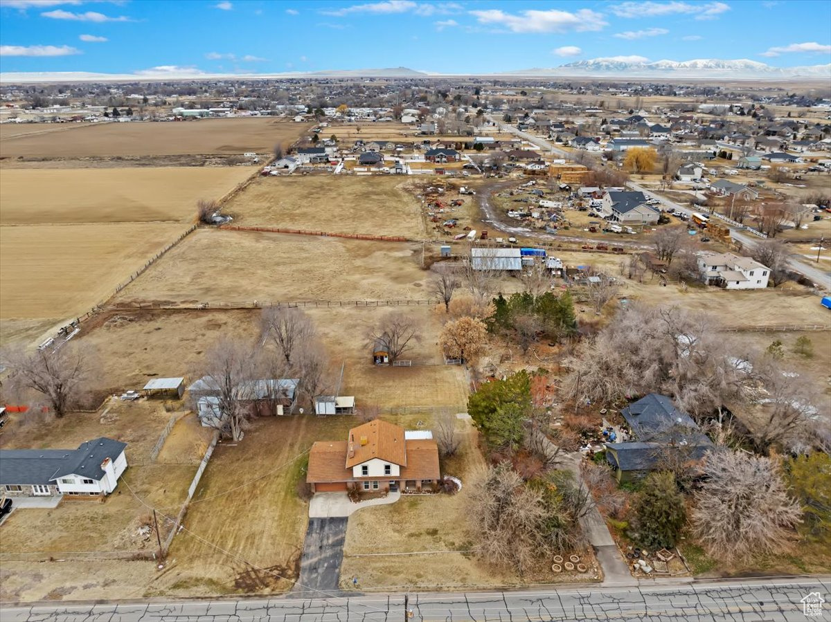 Drone / aerial view featuring a residential view and a mountain view