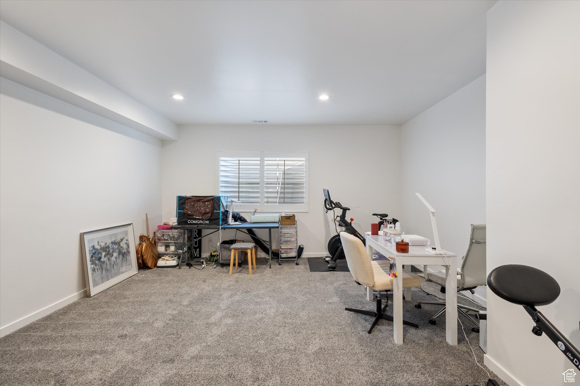 View of carpeted home office