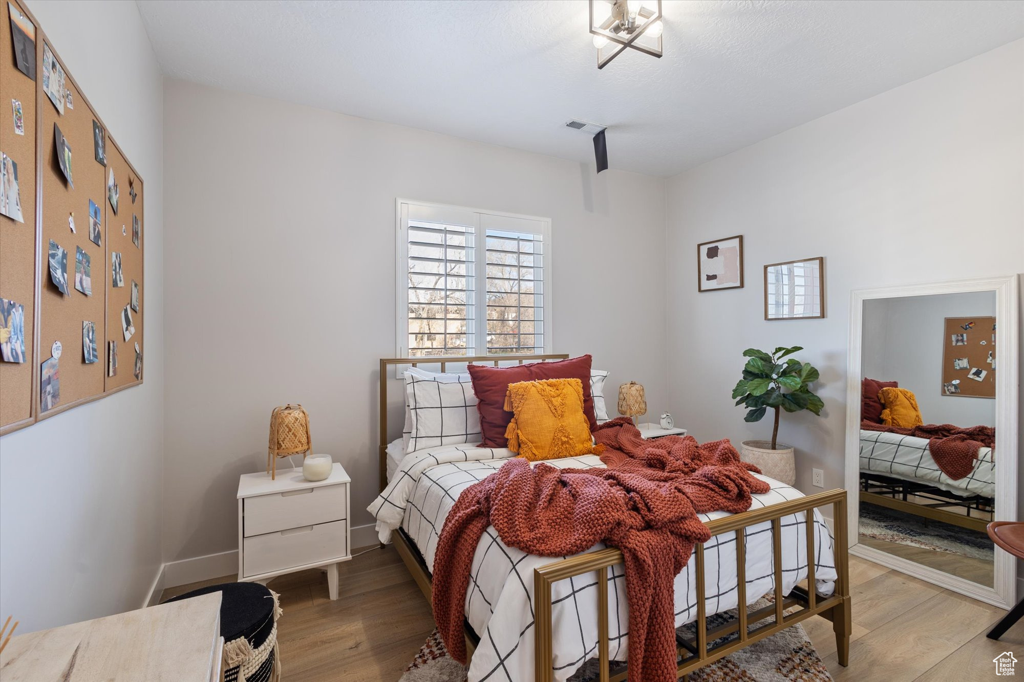 Bedroom featuring hardwood / wood-style flooring