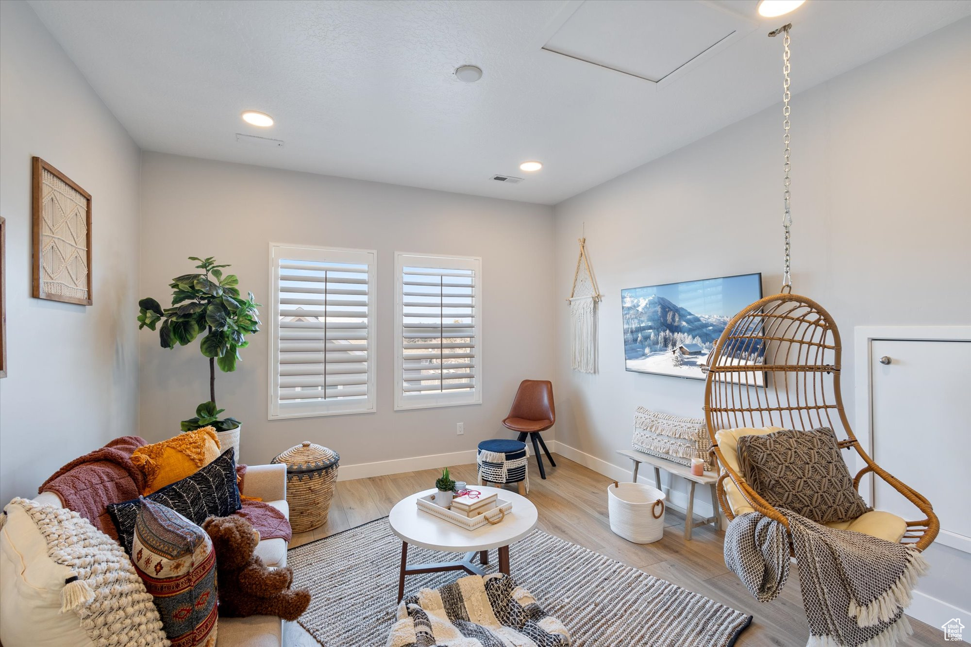 Sitting room with light wood-type flooring