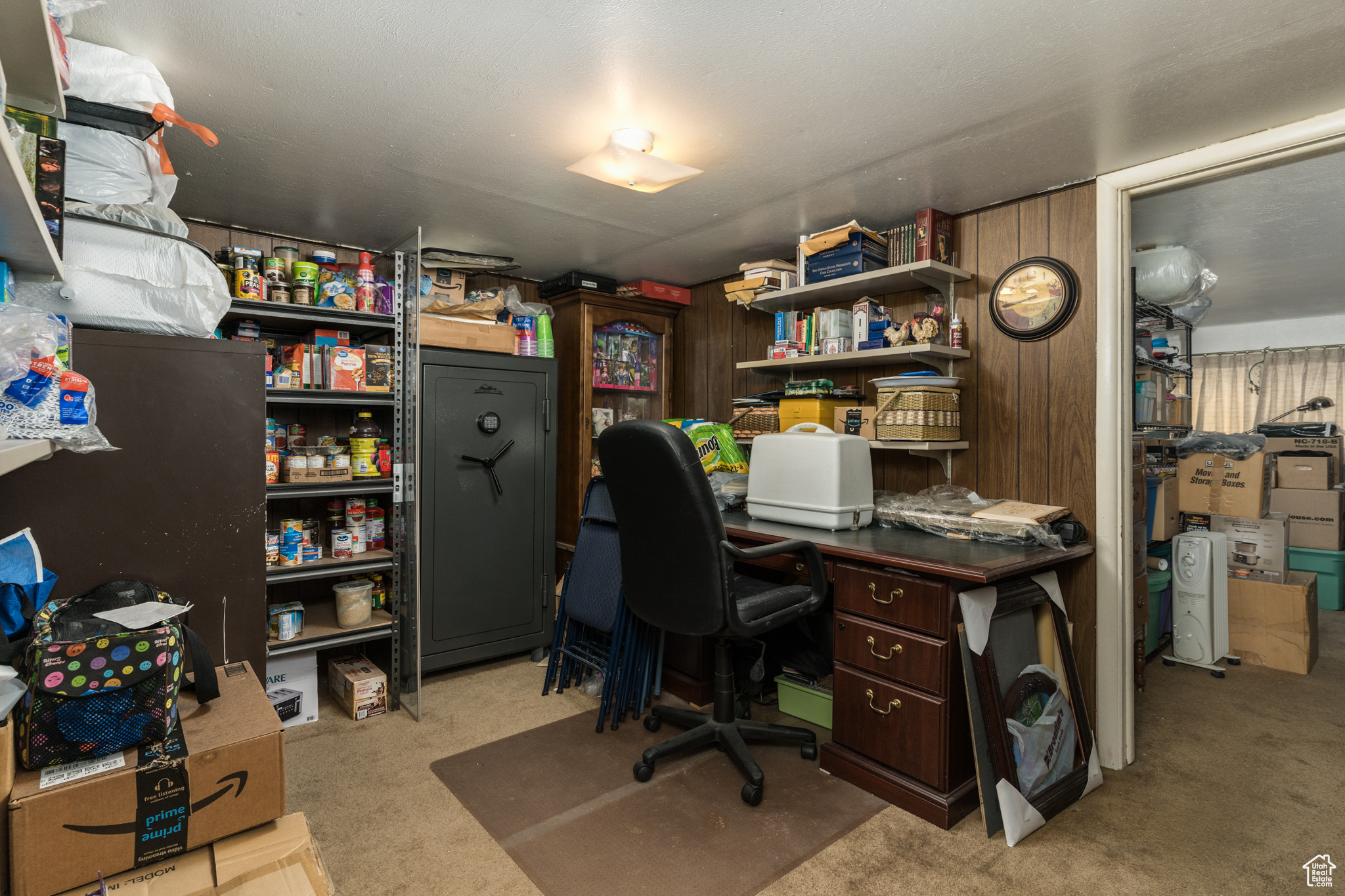 Home office featuring light carpet
