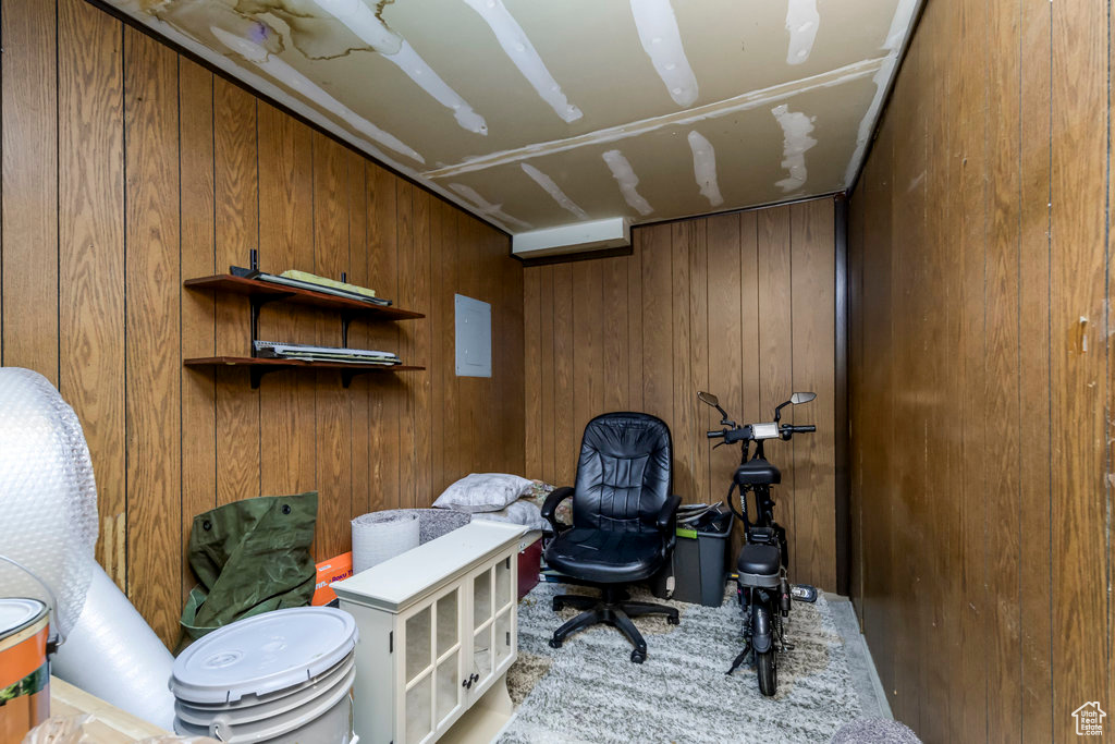 Office space featuring wooden walls